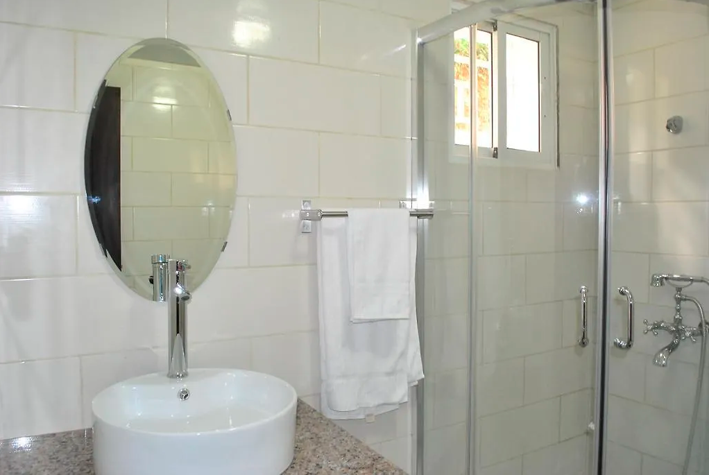 Fully Furnished Upscale Beachfront Apartments, Hotel & AirBnb for Rent in Cap-Haitien, Haiti (Rival Beach) – 1 & 2 Bedrooms – ALL INCLUSIVE! Private Villa Overlooking the Turquoise Blue Caribbean Ocean – Modern Furniture & Appliances, 24/7 Robust Solar-Powered Electricity, Commercial Size Backup Generator, Air-Conditioner Unit (A/C), Cable Television, WiFi Internet (Starlink), Security Guards on Rotations