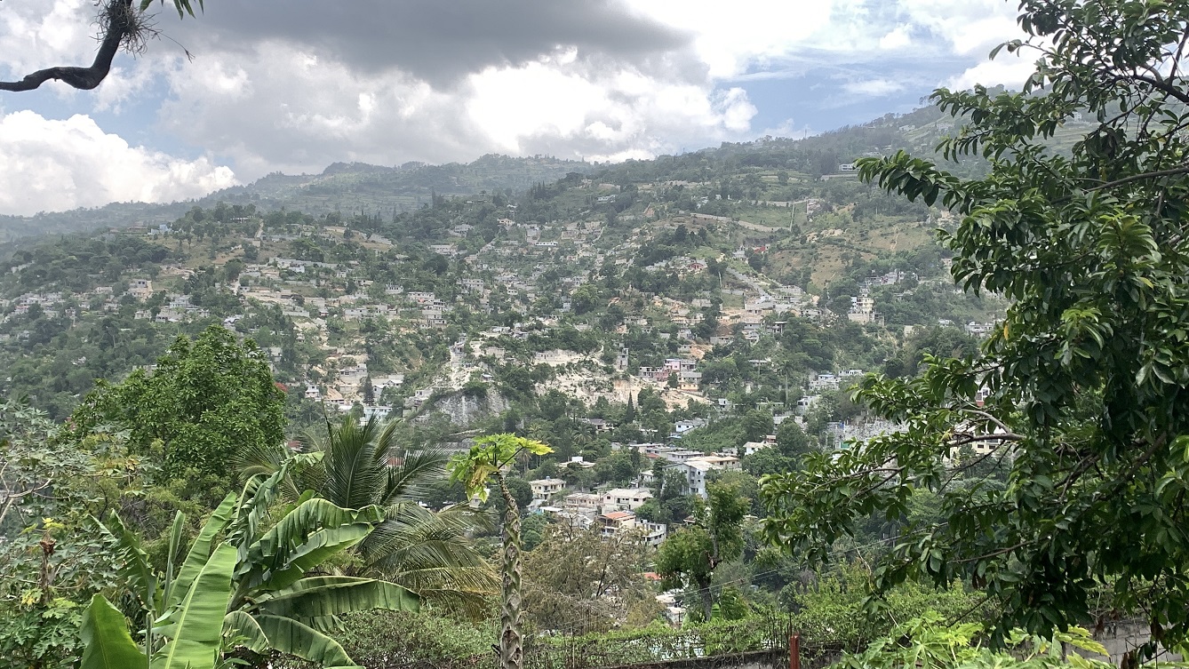 Premium Residential Land + Small 2-Bedroom , 1 Bath House for Sale in Pelerin 6 & 4 Petion-Ville, Haiti – 8 Centiemes (1,032m², 11,108ft², or 0.25 Acres) with Nicely Paved Roads, 100% Suburban Neighborhood, Highly Secure with Private Security Force, Flat, Build-Ready, 3-Way Fenced, Gated – Expensive Luxury Houses,  Apartment Complexes, Embassies, and Ambassadors in Area