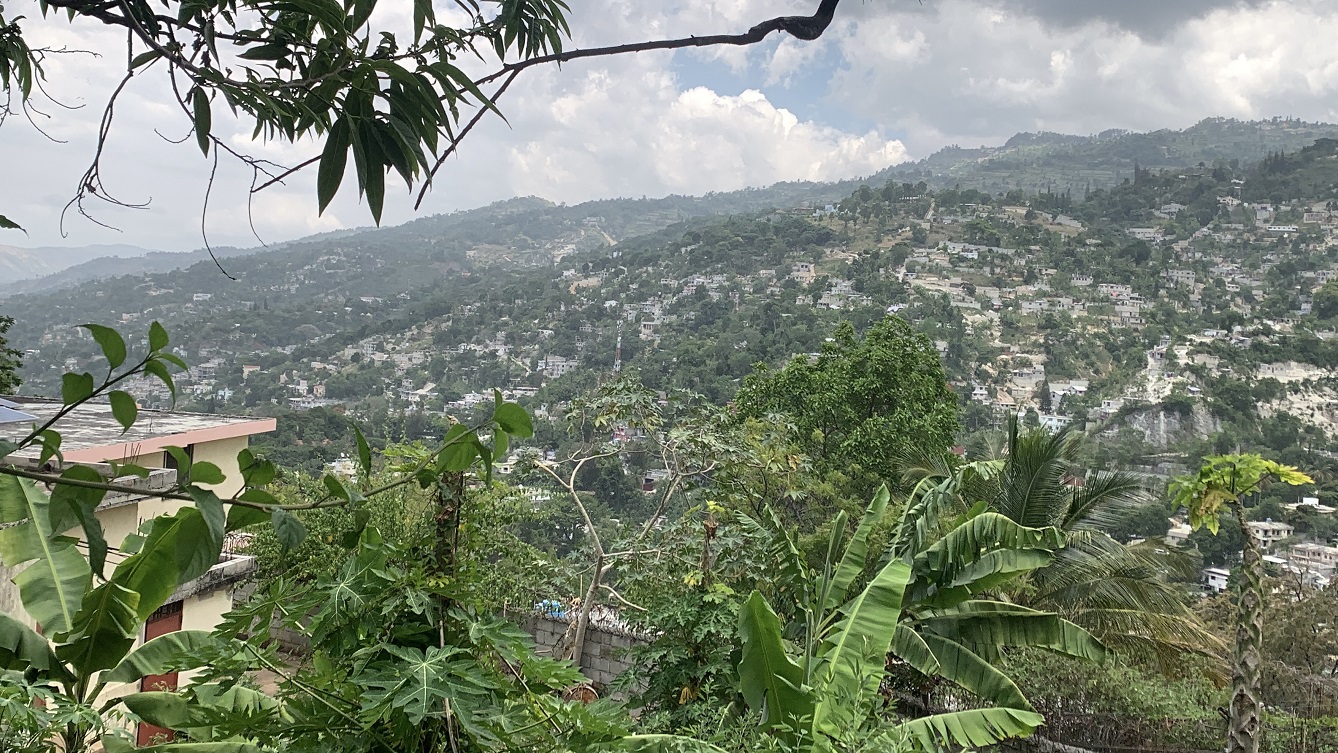 Premium Residential Land + Small 2-Bedroom , 1 Bath House for Sale in Pelerin 6 & 4 Petion-Ville, Haiti – 8 Centiemes (1,032m², 11,108ft², or 0.25 Acres) with Nicely Paved Roads, 100% Suburban Neighborhood, Highly Secure with Private Security Force, Flat, Build-Ready, 3-Way Fenced, Gated – Expensive Luxury Houses,  Apartment Complexes, Embassies, and Ambassadors in Area