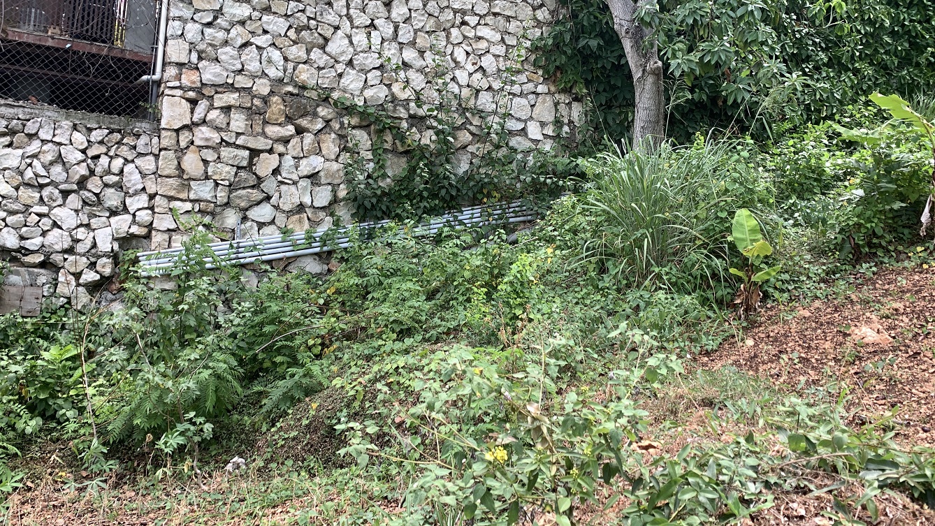 Premium Residential Land + Small 2-Bedroom , 1 Bath House for Sale in Pelerin 6 & 4 Petion-Ville, Haiti – 8 Centiemes (1,032m², 11,108ft², or 0.25 Acres) with Nicely Paved Roads, 100% Suburban Neighborhood, Highly Secure with Private Security Force, Flat, Build-Ready, 3-Way Fenced, Gated – Expensive Luxury Houses,  Apartment Complexes, Embassies, and Ambassadors in Area