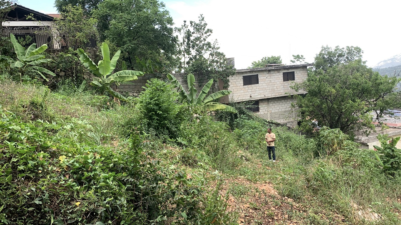 Premium Residential Land + Small 2-Bedroom , 1 Bath House for Sale in Pelerin 6 & 4 Petion-Ville, Haiti – 8 Centiemes (1,032m², 11,108ft², or 0.25 Acres) with Nicely Paved Roads, 100% Suburban Neighborhood, Highly Secure with Private Security Force, Flat, Build-Ready, 3-Way Fenced, Gated – Expensive Luxury Houses,  Apartment Complexes, Embassies, and Ambassadors in Area