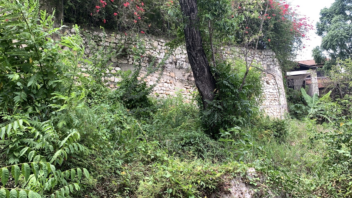 Premium Residential Land + Small 2-Bedroom , 1 Bath House for Sale in Pelerin 6 & 4 Petion-Ville, Haiti – 8 Centiemes (1,032m², 11,108ft², or 0.25 Acres) with Nicely Paved Roads, 100% Suburban Neighborhood, Highly Secure with Private Security Force, Flat, Build-Ready, 3-Way Fenced, Gated – Expensive Luxury Houses,  Apartment Complexes, Embassies, and Ambassadors in Area
