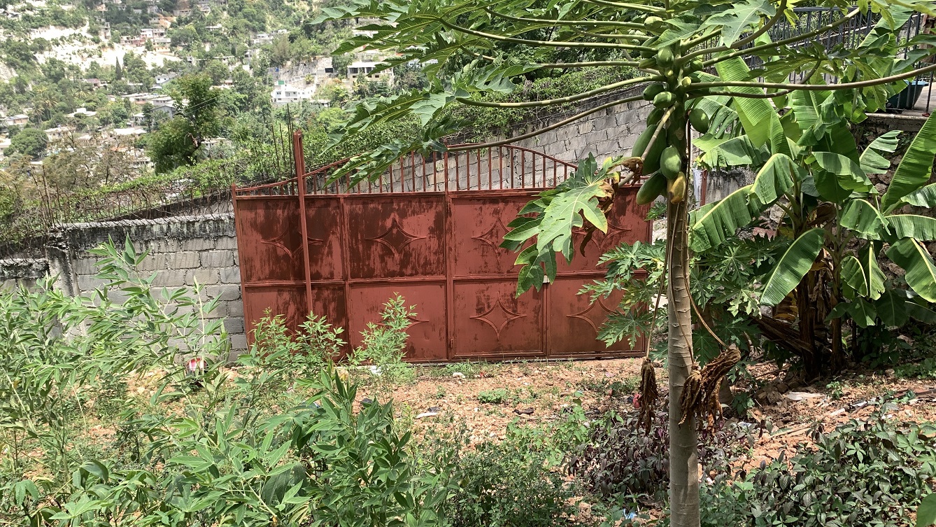 Premium Residential Land + Small 2-Bedroom , 1 Bath House for Sale in Pelerin 6 & 4 Petion-Ville, Haiti – 8 Centiemes (1,032m², 11,108ft², or 0.25 Acres) with Nicely Paved Roads, 100% Suburban Neighborhood, Highly Secure with Private Security Force, Flat, Build-Ready, 3-Way Fenced, Gated – Expensive Luxury Houses,  Apartment Complexes, Embassies, and Ambassadors in Area