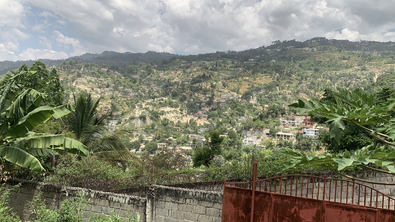 Premium Residential Land + Small 2-Bedroom , 1 Bath House for Sale in Pelerin 6 & 4 Petion-Ville, Haiti – 8 Centiemes (1,032m², 11,108ft², or 0.25 Acres) with Nicely Paved Roads, 100% Suburban Neighborhood, Highly Secure with Private Security Force, Flat, Build-Ready, 3-Way Fenced, Gated – Expensive Luxury Houses,  Apartment Complexes, Embassies, and Ambassadors in Area