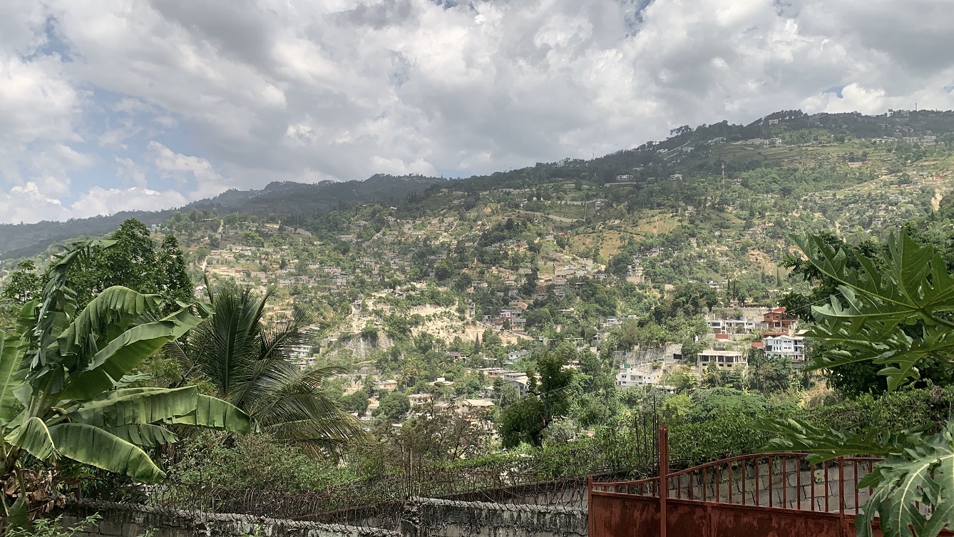 Premium Residential Land + Small 2-Bedroom , 1 Bath House for Sale in Pelerin 6 & 4 Petion-Ville, Haiti – 8 Centiemes (1,032m², 11,108ft², or 0.25 Acres) with Nicely Paved Roads, 100% Suburban Neighborhood, Highly Secure with Private Security Force, Flat, Build-Ready, 3-Way Fenced, Gated – Expensive Luxury Houses,  Apartment Complexes, Embassies, and Ambassadors in Area