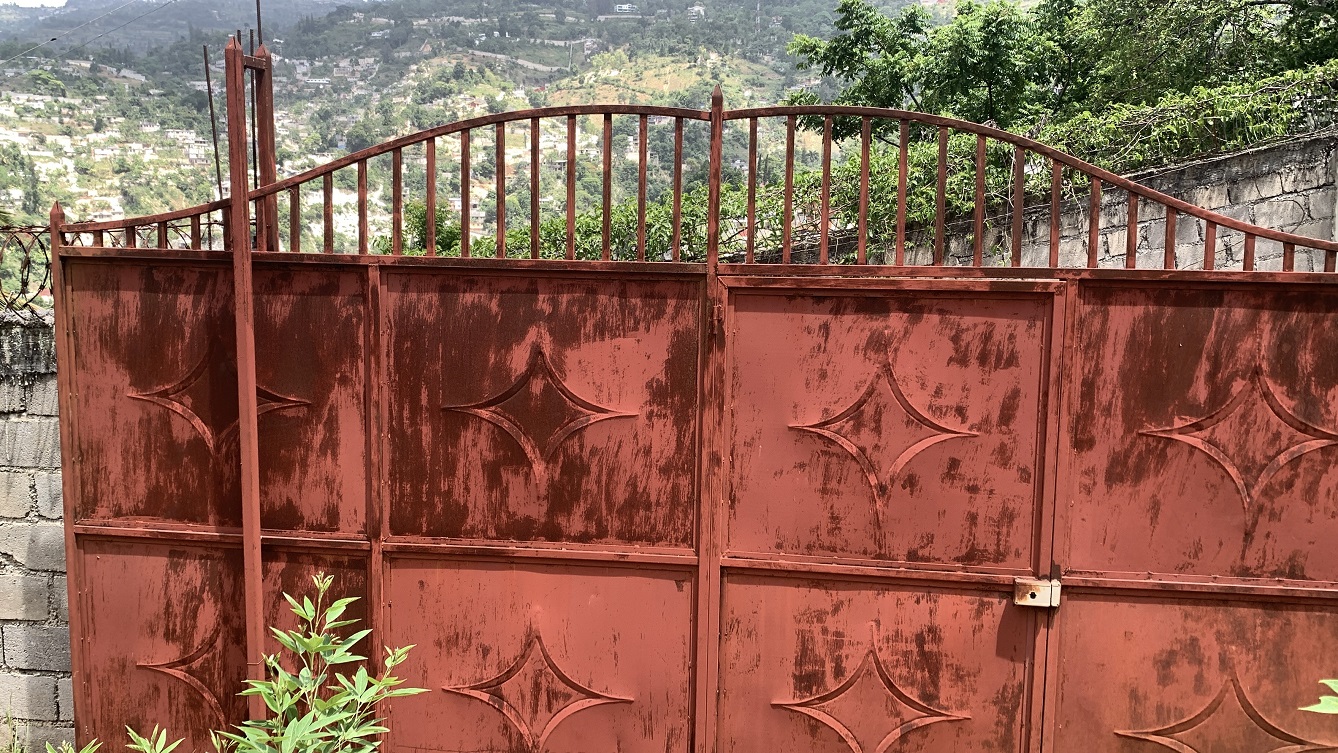 Premium Residential Land + Small 2-Bedroom , 1 Bath House for Sale in Pelerin 6 & 4 Petion-Ville, Haiti – 8 Centiemes (1,032m², 11,108ft², or 0.25 Acres) with Nicely Paved Roads, 100% Suburban Neighborhood, Highly Secure with Private Security Force, Flat, Build-Ready, 3-Way Fenced, Gated – Expensive Luxury Houses,  Apartment Complexes, Embassies, and Ambassadors in Area