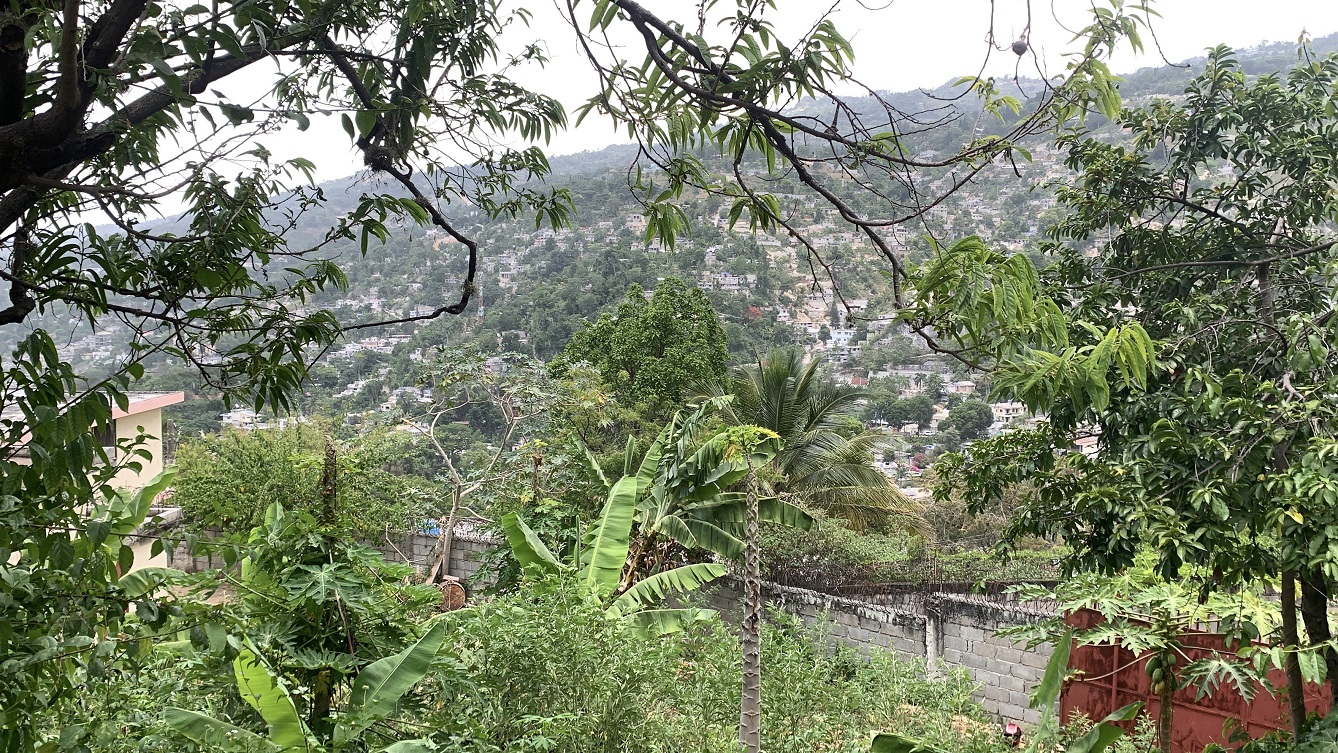 Premium Residential Land + Small 2-Bedroom , 1 Bath House for Sale in Pelerin 6 & 4 Petion-Ville, Haiti – 8 Centiemes (1,032m², 11,108ft², or 0.25 Acres) with Nicely Paved Roads, 100% Suburban Neighborhood, Highly Secure with Private Security Force, Flat, Build-Ready, 3-Way Fenced, Gated – Expensive Luxury Houses,  Apartment Complexes, Embassies, and Ambassadors in Area