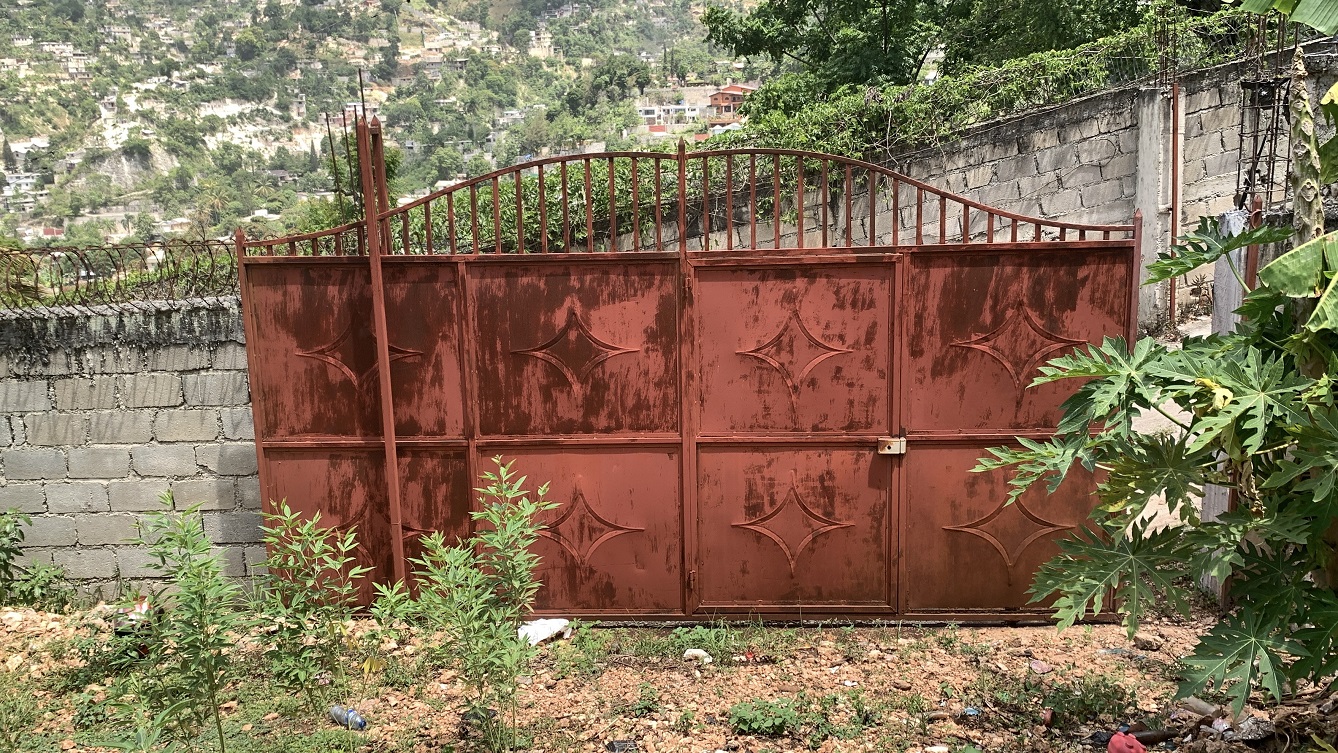 Premium Residential Land + Small 2-Bedroom , 1 Bath House for Sale in Pelerin 6 & 4 Petion-Ville, Haiti – 8 Centiemes (1,032m², 11,108ft², or 0.25 Acres) with Nicely Paved Roads, 100% Suburban Neighborhood, Highly Secure with Private Security Force, Flat, Build-Ready, 3-Way Fenced, Gated – Expensive Luxury Houses,  Apartment Complexes, Embassies, and Ambassadors in Area