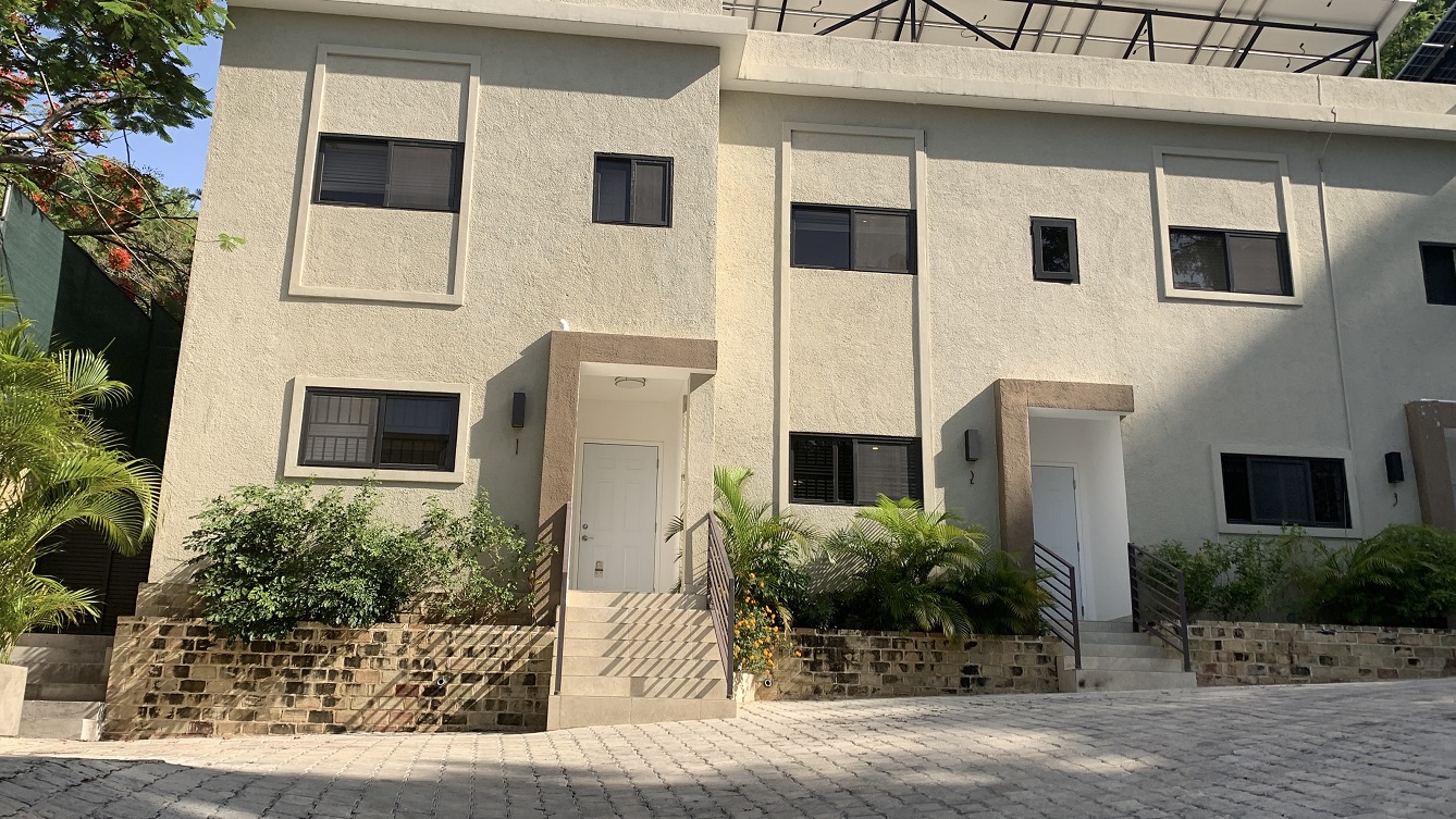 ALL-INCLUSIVE, Deluxe Furnished Apartment for RENT in Bourdon (Reimbol), Port-au-Prince, Haiti – 2 Spacious Bedrooms, 2.5 Super Clean Bathrooms, Stylish Living/Dining Rooms with Brand-New Contemporary Furniture & Appliances, Smart Kitchen, Private Backyard, Air Conditioner Units (A/C), Ceiling Fans, Washer/Dryer, Starlink High-Speed Internet, Satellite TV, 24/7 Electricity & Security Guards, Multiple-Parking Spaces, Move-in Ready