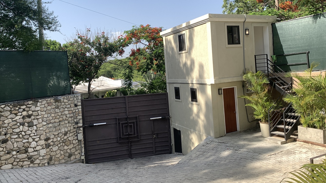 ALL-INCLUSIVE, Deluxe Furnished Apartment for RENT in Bourdon (Reimbol), Port-au-Prince, Haiti – 2 Spacious Bedrooms, 2.5 Super Clean Bathrooms, Stylish Living/Dining Rooms with Brand-New Contemporary Furniture & Appliances, Smart Kitchen, Private Backyard, Air Conditioner Units (A/C), Ceiling Fans, Washer/Dryer, Starlink High-Speed Internet, Satellite TV, 24/7 Electricity & Security Guards, Multiple-Parking Spaces, Move-in Ready