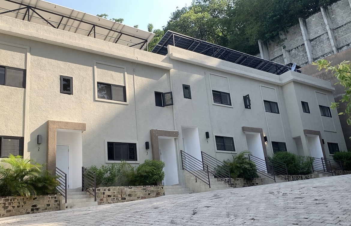 ALL-INCLUSIVE, Deluxe Furnished Apartment for RENT in Bourdon (Reimbol), Port-au-Prince, Haiti – 2 Spacious Bedrooms, 2.5 Super Clean Bathrooms, Stylish Living/Dining Rooms with Brand-New Contemporary Furniture & Appliances, Smart Kitchen, Private Backyard, Air Conditioner Units (A/C), Ceiling Fans, Washer/Dryer, Starlink High-Speed Internet, Satellite TV, 24/7 Electricity & Security Guards, Multiple-Parking Spaces, Move-in Ready