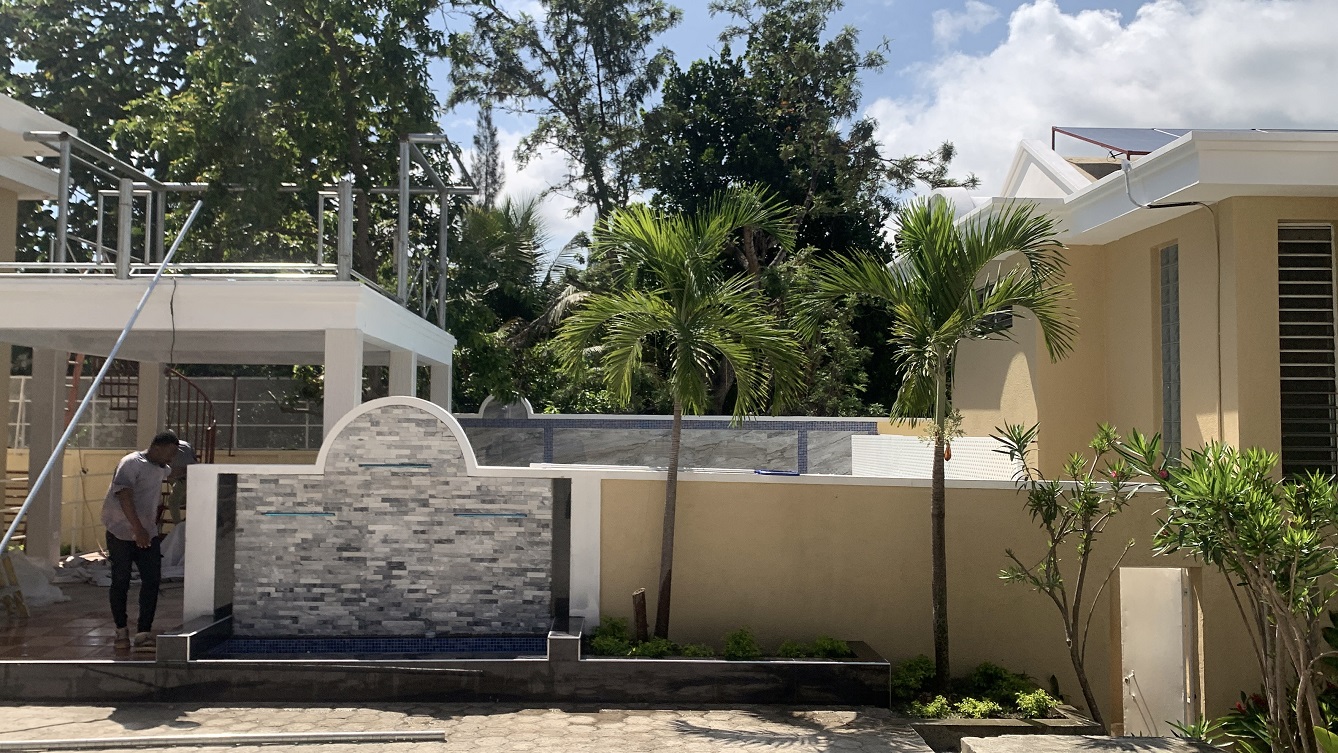 Brand-New, ALL-INCLUSIVE, Luxury Furnished Independent TOWNHOUSE for RENT in Laboule 10, Petion-Ville, Haiti – 3 Spacious Bedrooms (Master with Whirlpool Jacuzzi Bathtub), 2.5 Modern Bathrooms, Elegant Living/Dining Rooms, Fresh Contemporary Furniture & Appliances, Stylish Kitchen, Private Partially Covered Backyard, Air Conditioner Units (A/C), Ceiling Fans, Glistening Swimming Pool, Workout Gym, High-Speed Internet, Satellite TV, Exclusive, Personal Robust Solar-Powered System, Backup Generator, Security Guards, Washer/Dryer, Move-in Ready