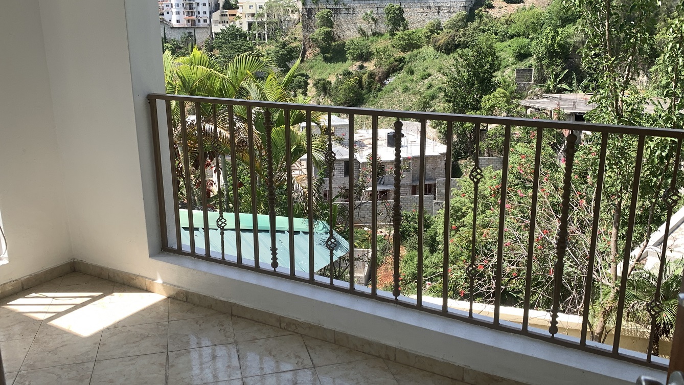 Brand-New, ALL-INCLUSIVE, Luxury Furnished Independent TOWNHOUSE for RENT in Laboule 10, Petion-Ville, Haiti – 3 Spacious Bedrooms (Master with Whirlpool Jacuzzi Bathtub), 2.5 Modern Bathrooms, Elegant Living/Dining Rooms, Fresh Contemporary Furniture & Appliances, Stylish Kitchen, Private Partially Covered Backyard, Air Conditioner Units (A/C), Ceiling Fans, Glistening Swimming Pool, Workout Gym, High-Speed Internet, Satellite TV, Exclusive, Personal Robust Solar-Powered System, Backup Generator, Security Guards, Washer/Dryer, Move-in Ready