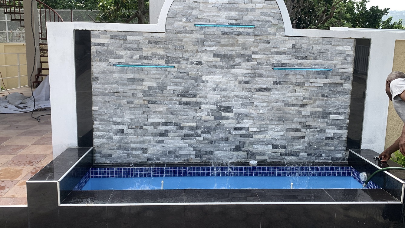 Brand-New, ALL-INCLUSIVE, Luxury Furnished Independent TOWNHOUSE for RENT in Laboule 10, Petion-Ville, Haiti – 3 Spacious Bedrooms (Master with Whirlpool Jacuzzi Bathtub), 2.5 Modern Bathrooms, Elegant Living/Dining Rooms, Fresh Contemporary Furniture & Appliances, Stylish Kitchen, Private Partially Covered Backyard, Air Conditioner Units (A/C), Ceiling Fans, Glistening Swimming Pool, Workout Gym, High-Speed Internet, Satellite TV, Exclusive, Personal Robust Solar-Powered System, Backup Generator, Security Guards, Washer/Dryer, Move-in Ready