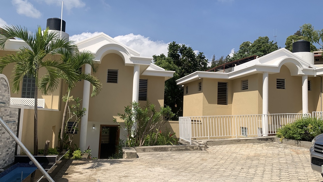 Brand-New, ALL-INCLUSIVE, Luxury Furnished TOWNHOUSES for RENT in Laboule 10, Petion-Ville, Haiti – 3 Spacious Bedrooms (Master with Whirlpool Jacuzzi Bathtub), 2.5 Modern Bathrooms, Elegant Living/Dining Rooms, Fresh Contemporary Furniture & Appliances, Stylish Kitchen, Private Partially Covered Backyard, Air Conditioner Units (A/C), Ceiling Fans, Glistening Swimming Pool, Workout Gym, High-Speed Internet, Satellite TV, Exclusive, Personal Robust Solar-Powered System, Backup Generator, Security Guards, Washer/Dryer, Move-in Ready