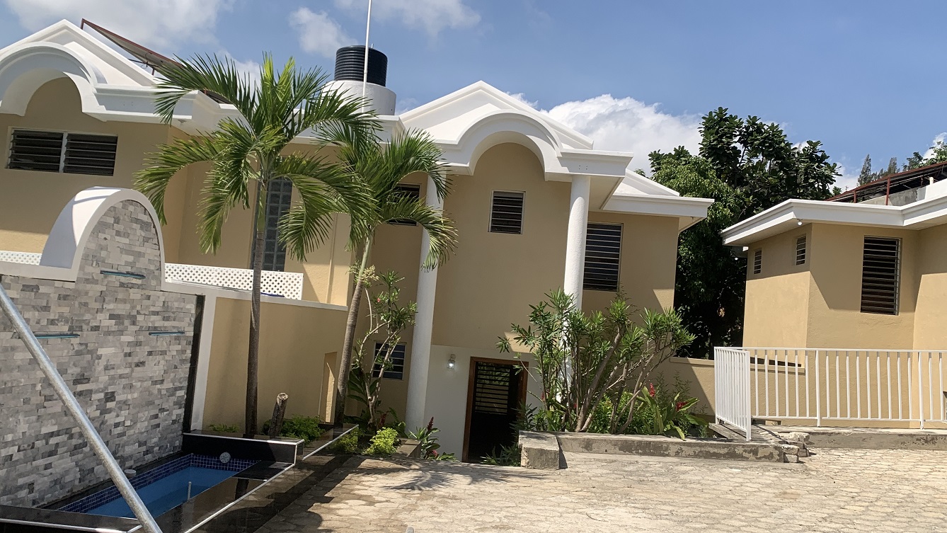 Brand-New, ALL-INCLUSIVE, Luxury Furnished TOWNHOUSES for RENT in Laboule 10, Petion-Ville, Haiti – 3 Spacious Bedrooms (Master with Whirlpool Jacuzzi Bathtub), 2.5 Modern Bathrooms, Elegant Living/Dining Rooms, Fresh Contemporary Furniture & Appliances, Stylish Kitchen, Private Partially Covered Backyard, Air Conditioner Units (A/C), Ceiling Fans, Glistening Swimming Pool, Workout Gym, High-Speed Internet, Satellite TV, Exclusive, Personal Robust Solar-Powered System, Backup Generator, Security Guards, Washer/Dryer, Move-in Ready