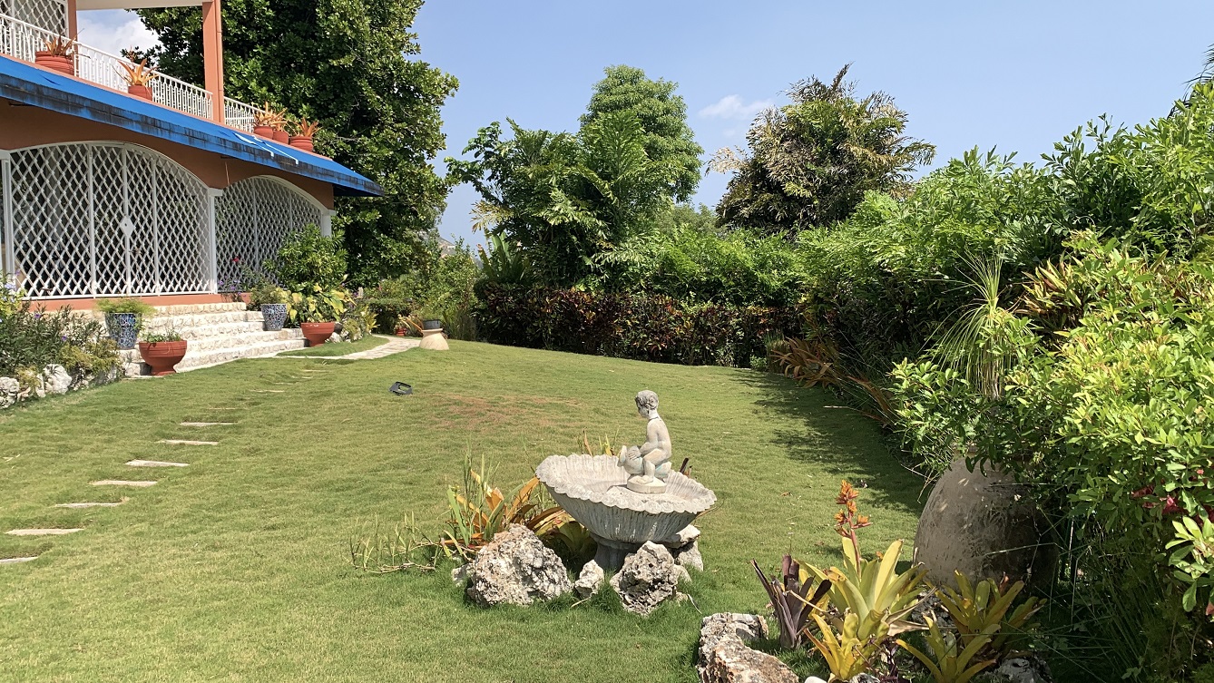 FURNISHED LUXURY MOUNTAIN ESTATE for RENT, Montagne Noire (Lower – Near Spain’s Embassy), Petion-Ville, Haiti – 4 Spacious Bedrooms, 5 Bathrooms, Office Space, Expensive Modern Antique Furniture, Modern Appliances, 24/7 Robust Solar-Powered Electricity, Backup Generator, Security Guards on Rotation, WiFi/Internet, Servant Quarter, Big Yards with Flowers, Lush Greenery & Manicured Grass, Gleaming Swimming Pool, Parking for 5+ Cars