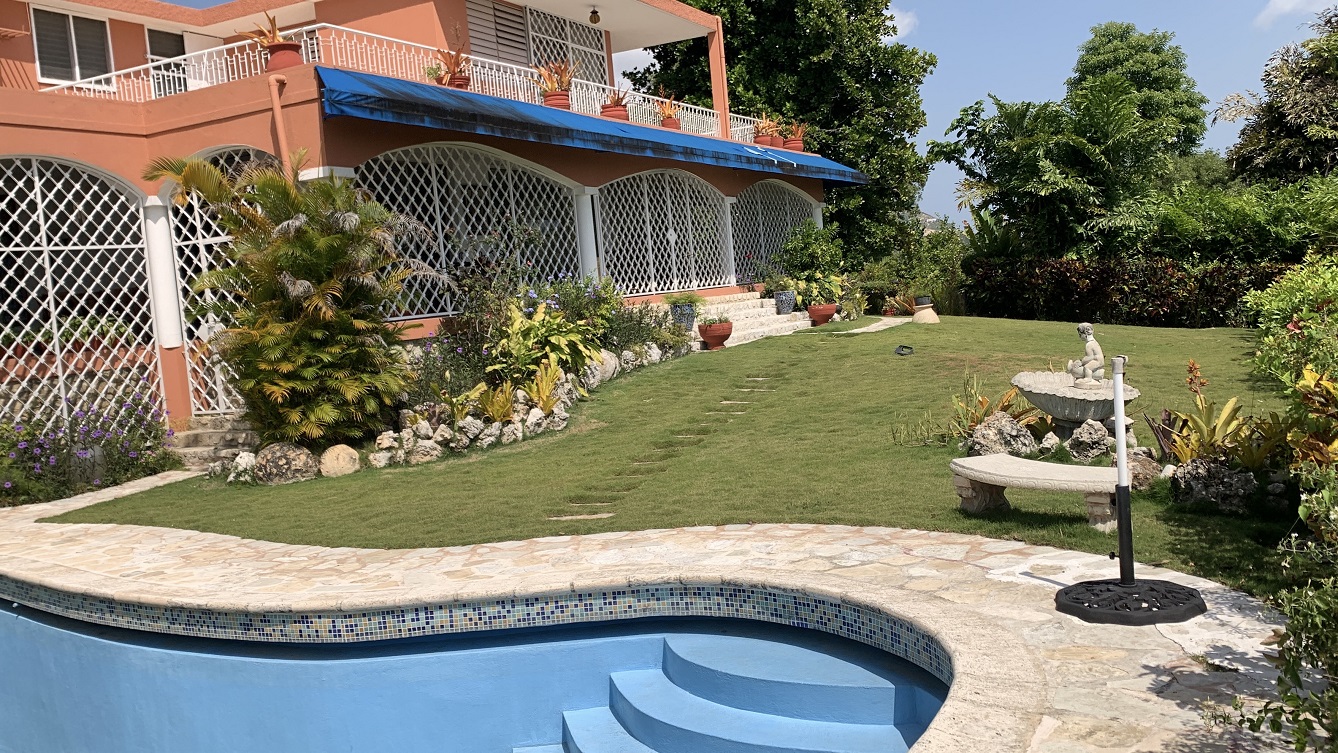 FURNISHED LUXURY MOUNTAIN ESTATE for RENT, Montagne Noire (Lower – Near Spain’s Embassy), Petion-Ville, Haiti – 4 Spacious Bedrooms, 5 Bathrooms, Office Space, Expensive Modern Antique Furniture, Modern Appliances, 24/7 Robust Solar-Powered Electricity, Backup Generator, Security Guards on Rotation, WiFi/Internet, Servant Quarter, Big Yards with Flowers, Lush Greenery & Manicured Grass, Gleaming Swimming Pool, Parking for 5+ Cars