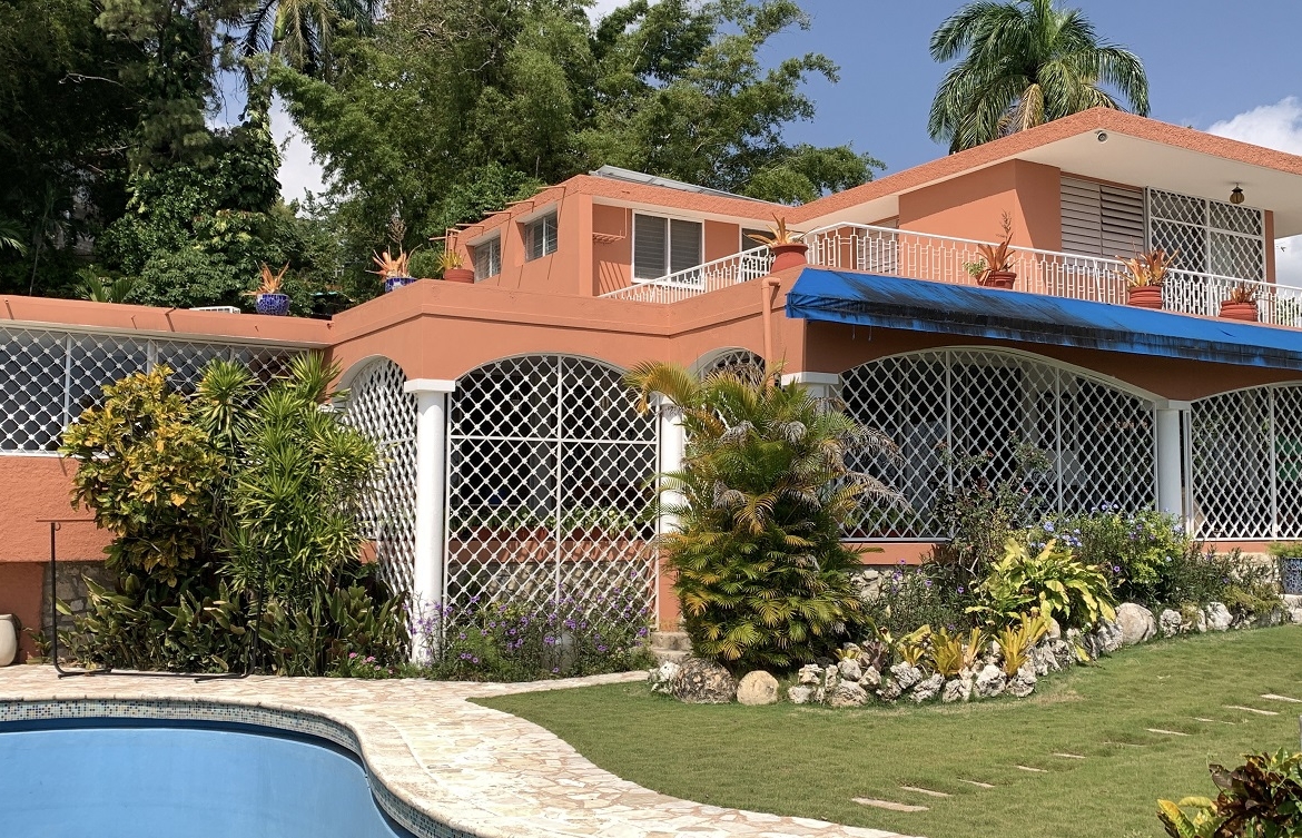 FURNISHED LUXURY MOUNTAIN ESTATE for RENT, Montagne Noire (Lower – Near Spain’s Embassy), Petion-Ville, Haiti – 4 Spacious Bedrooms, 5 Bathrooms, Office Space, Expensive Modern Antique Furniture, Modern Appliances, 24/7 Robust Solar-Powered Electricity, Backup Generator, Security Guards on Rotation, WiFi/Internet, Servant Quarter, Big Yards with Flowers, Lush Greenery & Manicured Grass, Gleaming Swimming Pool, Parking for 5+ Cars