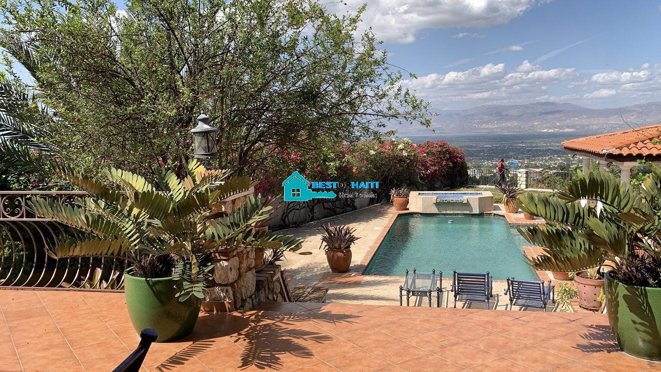 Luxury Fully Furnished Mansion for Rent in the Montana Hotel area of Petion-Ville, Haiti – 5 Spacious Bedrooms, 6 Bathrooms, Sparkling Swimming Pool, Jacuzzi, Whirlpool Jacuzzi Tubs, Air-Conditioner Units (A/C), Ceiling Fans, Washer/Dryer, Breathtaking Views, Strong Solar-Powered Electricity System, Bulletproof Doors/Windowns, Parking for 10 Cars, Servant Quarter, Round-the-Clock Armed Security Guards, Elicopter Landing Pad & More…