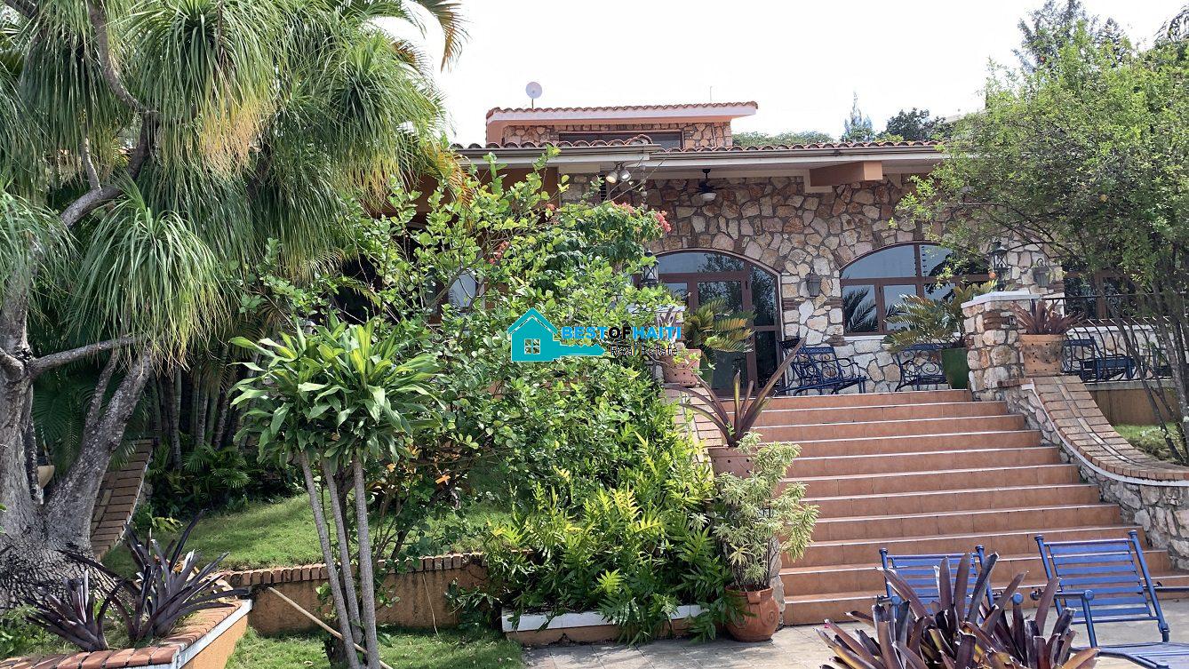 Luxury Fully Furnished Mansion for Rent in the Montana Hotel area of Petion-Ville, Haiti – 5 Spacious Bedrooms, 6 Bathrooms, Sparkling Swimming Pool, Jacuzzi, Whirlpool Jacuzzi Tubs, Air-Conditioner Units (A/C), Ceiling Fans, Washer/Dryer, Breathtaking Views, Strong Solar-Powered Electricity System, Bulletproof Doors/Windowns, Parking for 10 Cars, Servant Quarter, Round-the-Clock Armed Security Guards, Elicopter Landing Pad & More…
