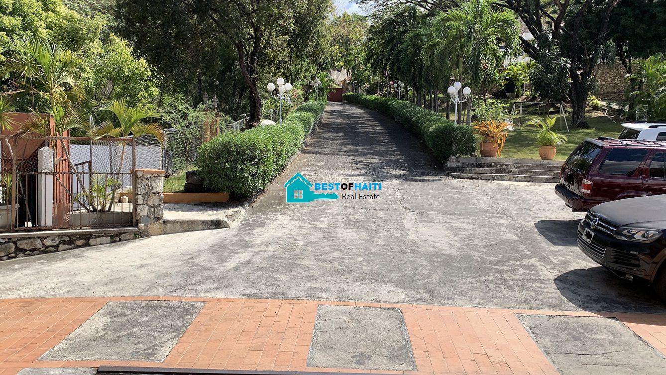 Luxury Fully Furnished Mansion for Rent in the Montana Hotel area of Petion-Ville, Haiti – 5 Spacious Bedrooms, 6 Bathrooms, Sparkling Swimming Pool, Jacuzzi, Whirlpool Jacuzzi Tubs, Air-Conditioner Units (A/C), Ceiling Fans, Washer/Dryer, Breathtaking Views, Strong Solar-Powered Electricity System, Bulletproof Doors/Windowns, Parking for 10 Cars, Servant Quarter, Round-the-Clock Armed Security Guards, Elicopter Landing Pad & More…
