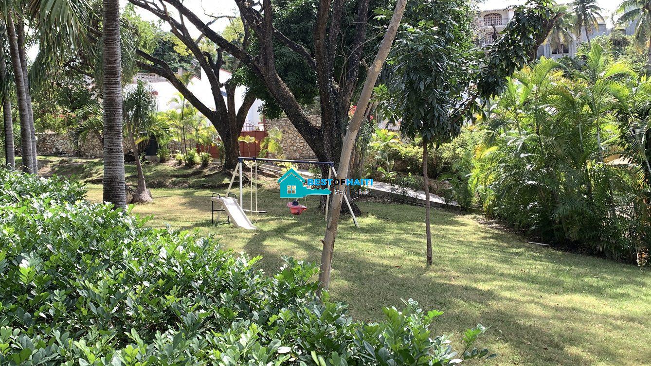 Luxury Fully Furnished Mansion for Rent in the Montana Hotel area of Petion-Ville, Haiti – 5 Spacious Bedrooms, 6 Bathrooms, Sparkling Swimming Pool, Jacuzzi, Whirlpool Jacuzzi Tubs, Air-Conditioner Units (A/C), Ceiling Fans, Washer/Dryer, Breathtaking Views, Strong Solar-Powered Electricity System, Bulletproof Doors/Windowns, Parking for 10 Cars, Servant Quarter, Round-the-Clock Armed Security Guards, Elicopter Landing Pad & More…