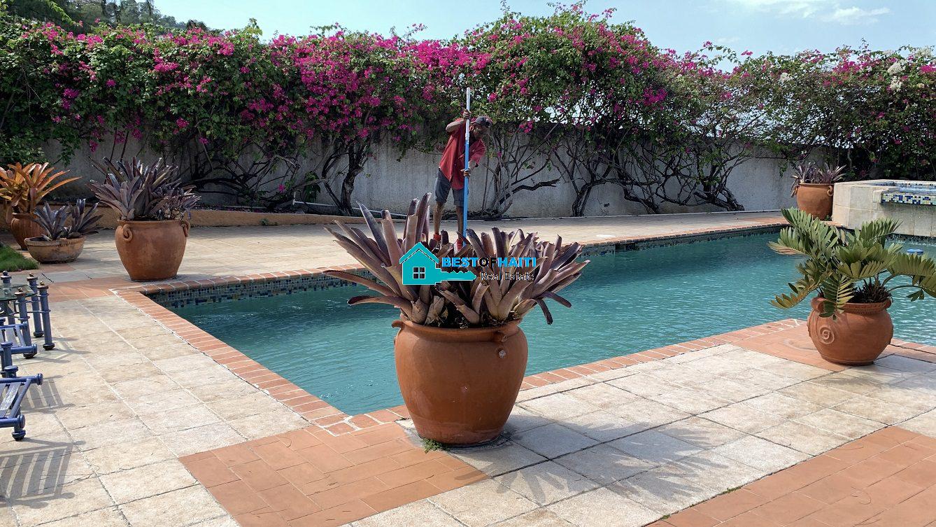 Luxury Fully Furnished Mansion for Rent in the Montana Hotel area of Petion-Ville, Haiti – 5 Spacious Bedrooms, 6 Bathrooms, Sparkling Swimming Pool, Jacuzzi, Whirlpool Jacuzzi Tubs, Air-Conditioner Units (A/C), Ceiling Fans, Washer/Dryer, Breathtaking Views, Strong Solar-Powered Electricity System, Bulletproof Doors/Windowns, Parking for 10 Cars, Servant Quarter, Round-the-Clock Armed Security Guards, Elicopter Landing Pad & More…