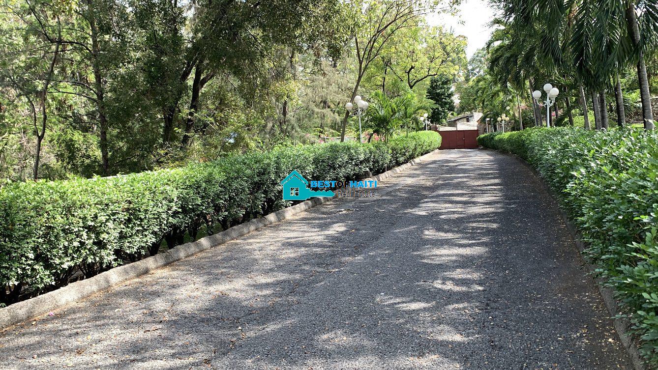 Luxury Fully Furnished Mansion for Rent in the Montana Hotel area of Petion-Ville, Haiti – 5 Spacious Bedrooms, 6 Bathrooms, Sparkling Swimming Pool, Jacuzzi, Whirlpool Jacuzzi Tubs, Air-Conditioner Units (A/C), Ceiling Fans, Washer/Dryer, Breathtaking Views, Strong Solar-Powered Electricity System, Bulletproof Doors/Windowns, Parking for 10 Cars, Servant Quarter, Round-the-Clock Armed Security Guards, Elicopter Landing Pad & More…
