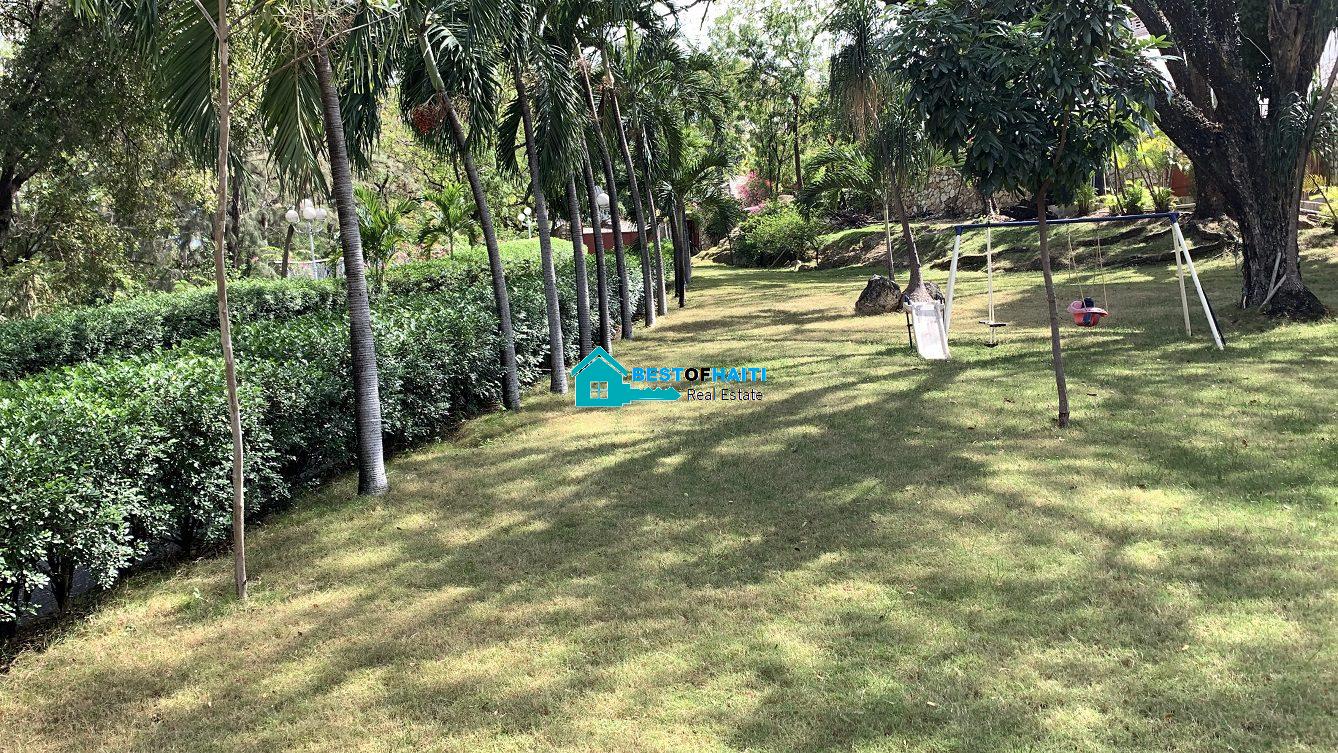 Luxury Fully Furnished Mansion for Rent in the Montana Hotel area of Petion-Ville, Haiti – 5 Spacious Bedrooms, 6 Bathrooms, Sparkling Swimming Pool, Jacuzzi, Whirlpool Jacuzzi Tubs, Air-Conditioner Units (A/C), Ceiling Fans, Washer/Dryer, Breathtaking Views, Strong Solar-Powered Electricity System, Bulletproof Doors/Windowns, Parking for 10 Cars, Servant Quarter, Round-the-Clock Armed Security Guards, Elicopter Landing Pad & More…