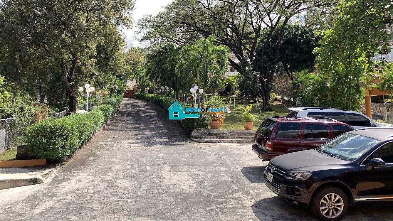 Luxury Fully Furnished Mansion for Rent in the Montana Hotel area of Petion-Ville, Haiti – 5 Spacious Bedrooms, 6 Bathrooms, Sparkling Swimming Pool, Jacuzzi, Whirlpool Jacuzzi Tubs, Air-Conditioner Units (A/C), Ceiling Fans, Washer/Dryer, Breathtaking Views, Strong Solar-Powered Electricity System, Bulletproof Doors/Windowns, Parking for 10 Cars, Servant Quarter, Round-the-Clock Armed Security Guards, Elicopter Landing Pad & More…
