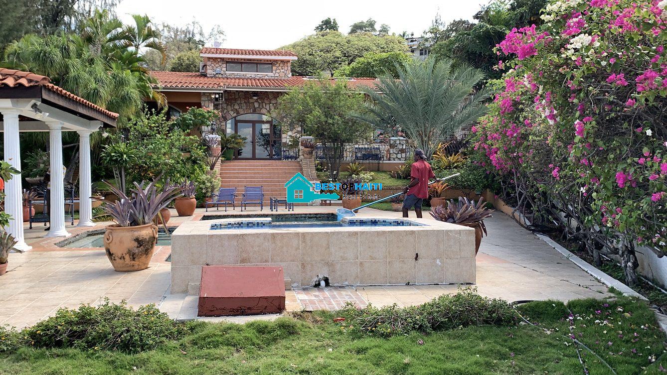 Luxury Fully Furnished Mansion for Rent in the Montana Hotel area of Petion-Ville, Haiti – 5 Spacious Bedrooms, 6 Bathrooms, Sparkling Swimming Pool, Jacuzzi, Whirlpool Jacuzzi Tubs, Air-Conditioner Units (A/C), Ceiling Fans, Washer/Dryer, Breathtaking Views, Strong Solar-Powered Electricity System, Bulletproof Doors/Windowns, Parking for 10 Cars, Servant Quarter, Round-the-Clock Armed Security Guards, Elicopter Landing Pad & More…