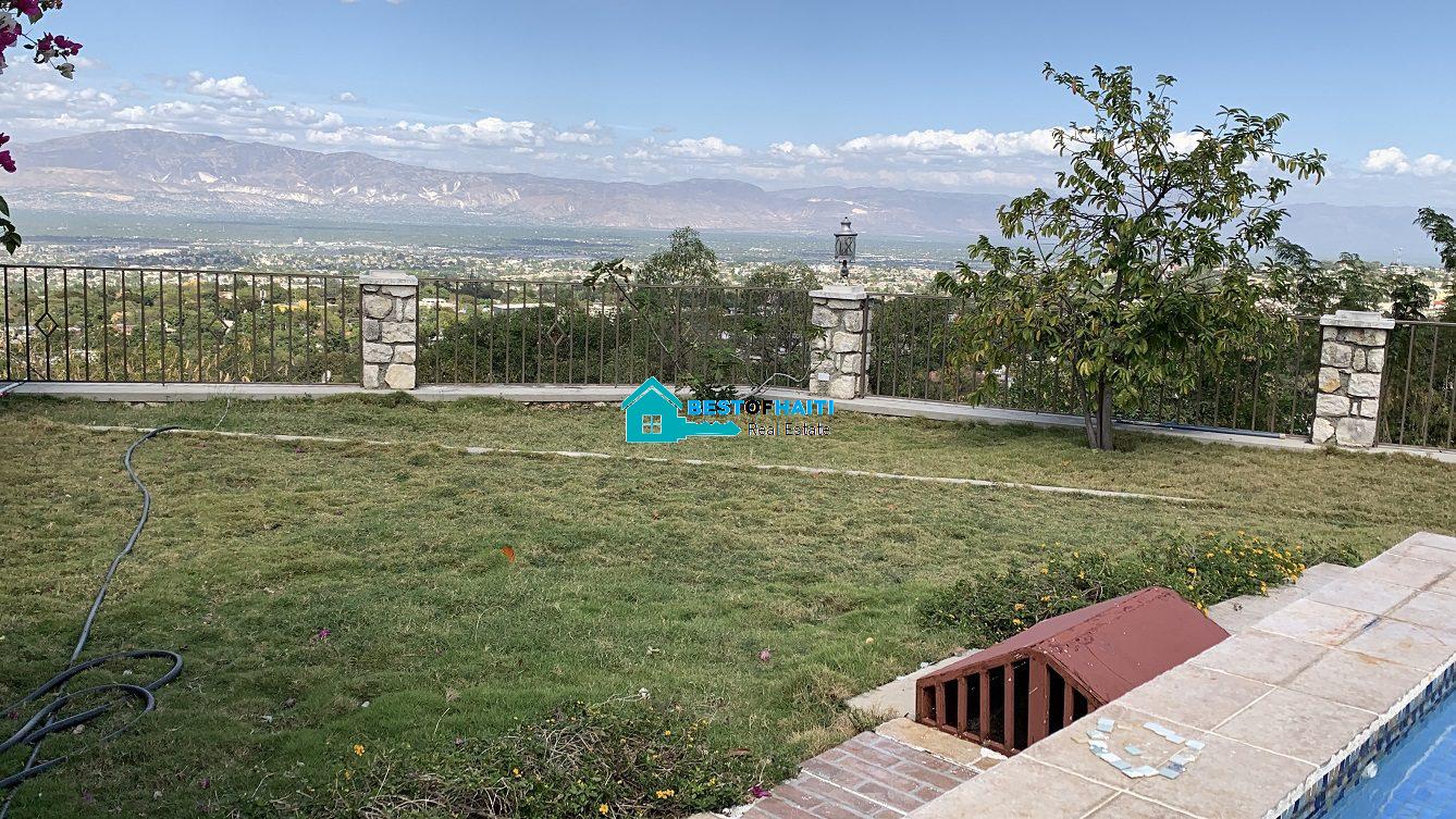 Luxury Fully Furnished Mansion for Rent in the Montana Hotel area of Petion-Ville, Haiti – 5 Spacious Bedrooms, 6 Bathrooms, Sparkling Swimming Pool, Jacuzzi, Whirlpool Jacuzzi Tubs, Air-Conditioner Units (A/C), Ceiling Fans, Washer/Dryer, Breathtaking Views, Strong Solar-Powered Electricity System, Bulletproof Doors/Windowns, Parking for 10 Cars, Servant Quarter, Round-the-Clock Armed Security Guards, Elicopter Landing Pad & More…