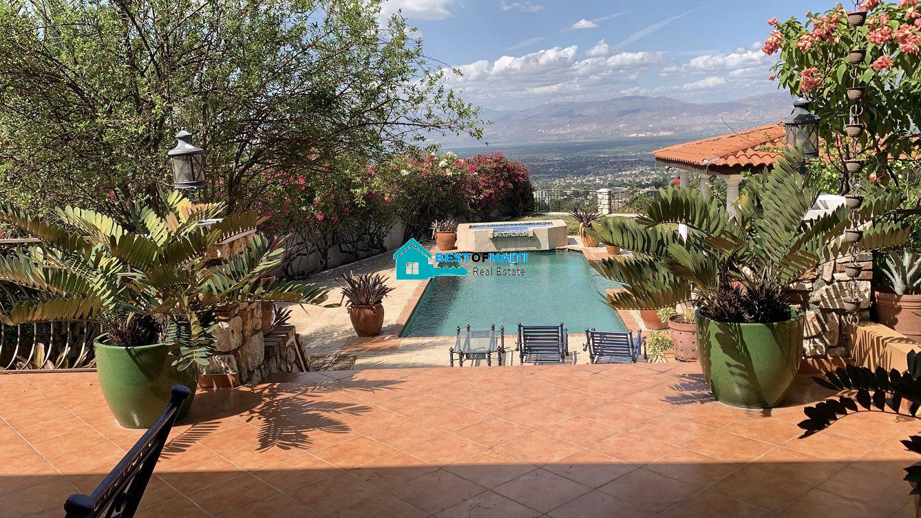 Luxury Fully Furnished Mansion for Rent in the Montana Hotel area of Petion-Ville, Haiti – 5 Spacious Bedrooms, 6 Bathrooms, Sparkling Swimming Pool, Jacuzzi, Whirlpool Jacuzzi Tubs, Air-Conditioner Units (A/C), Ceiling Fans, Washer/Dryer, Breathtaking Views, Strong Solar-Powered Electricity System, Bulletproof Doors/Windowns, Parking for 10 Cars, Servant Quarter, Round-the-Clock Armed Security Guards, Elicopter Landing Pad & More…