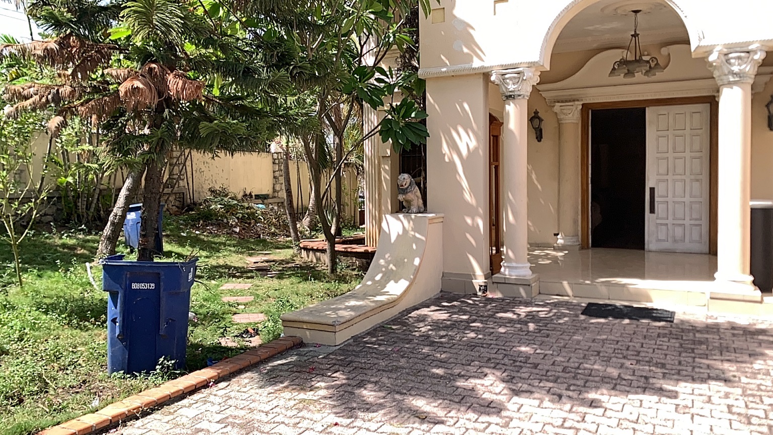 Palace-Style Villa for Sale, Vivy Mitchell, Petion-Ville, Haiti – House or Home has 6 Spacious Bedrooms, 5 1/2 Bathrooms, Multiple Grand Living & Dining Rooms, Majestic Kitchen, Whirlpool Jacuzzi Tub in Master Bedroom, Walk-in Closet, Basement Game Room & Gym, Floor-to-Ceiling Windows, Big Balconies, Terrace & Decks, Indoor & Outdoor Seating Areas, Ample Front-Back Yard Space, Reserved Space for Swimming Pool, Fruits, Vegetables, Tropical Trees, Two Gates, Brick Fence, Parking for 13+ Cars