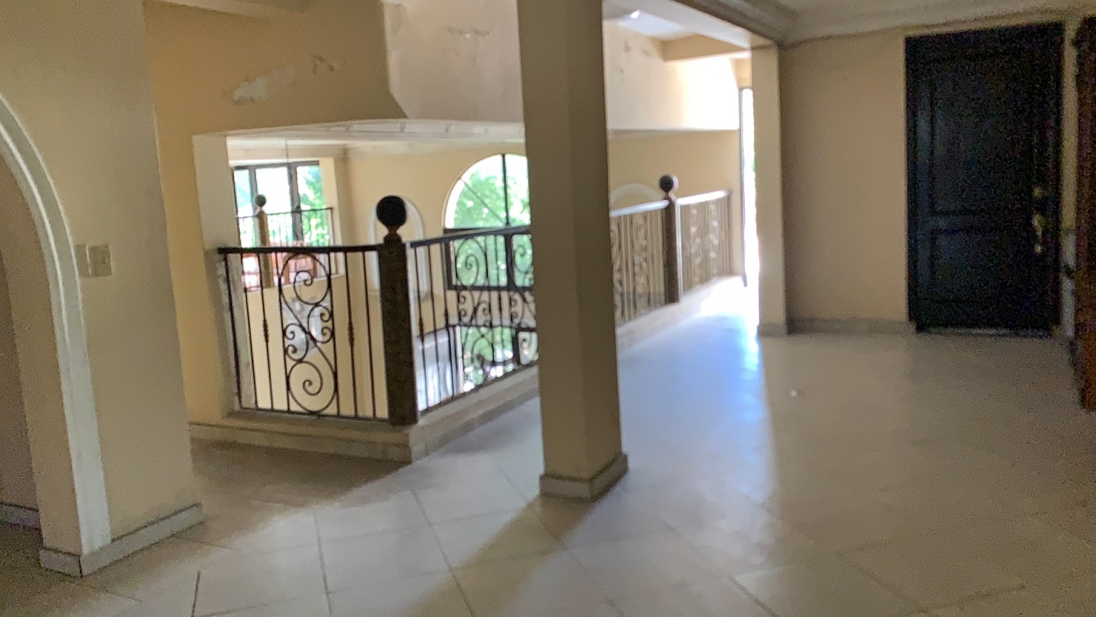 Palace-Style Villa for Sale, Vivy Mitchell, Petion-Ville, Haiti – House or Home has 6 Spacious Bedrooms, 5 1/2 Bathrooms, Multiple Grand Living & Dining Rooms, Majestic Kitchen, Whirlpool Jacuzzi Tub in Master Bedroom, Walk-in Closet, Basement Game Room & Gym, Floor-to-Ceiling Windows, Big Balconies, Terrace & Decks, Indoor & Outdoor Seating Areas, Ample Front-Back Yard Space, Reserved Space for Swimming Pool, Fruits, Vegetables, Tropical Trees, Two Gates, Brick Fence, Parking for 13+ Cars