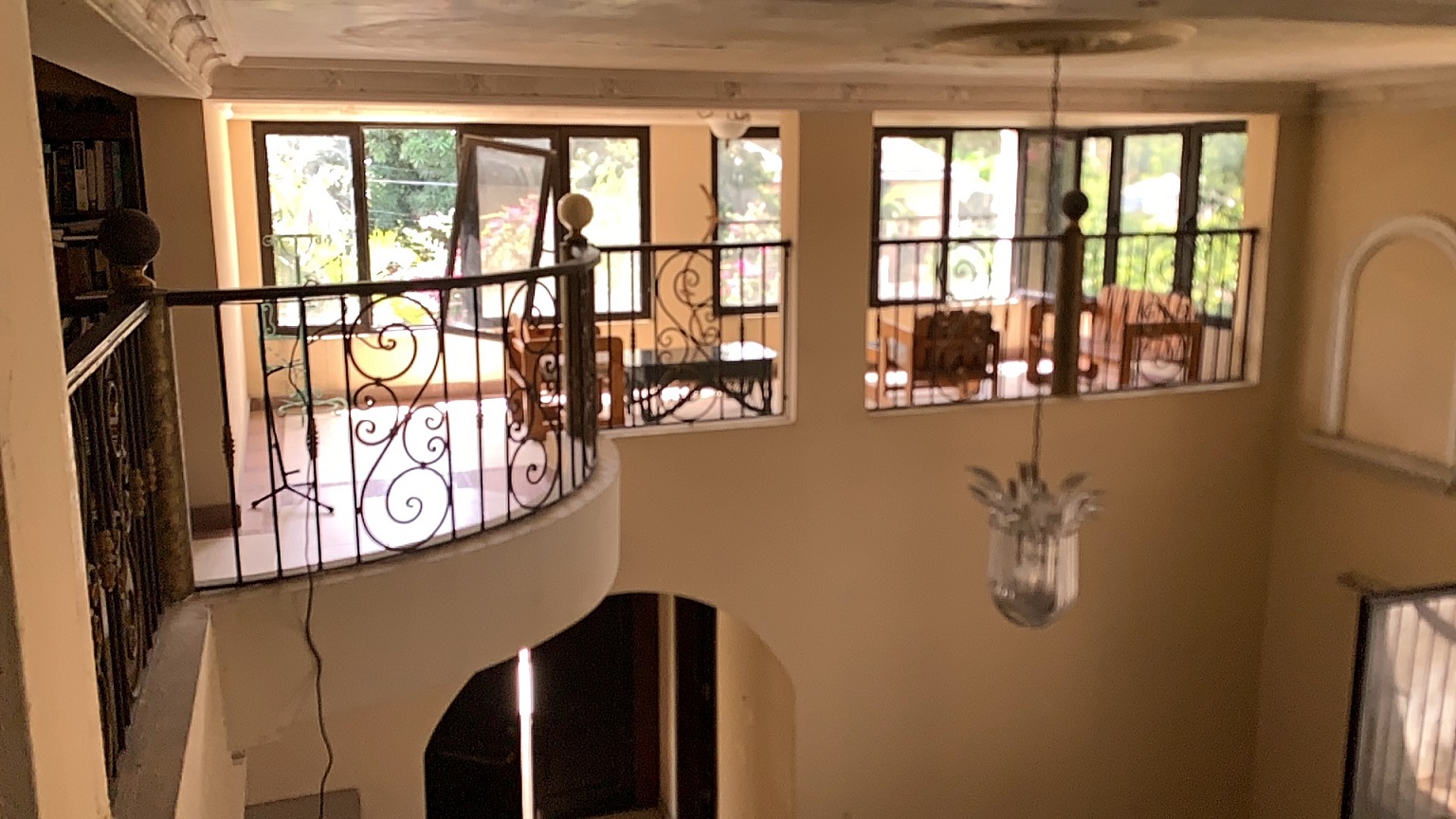 Palace-Style Villa for Sale, Vivy Mitchell, Petion-Ville, Haiti – House or Home has 6 Spacious Bedrooms, 5 1/2 Bathrooms, Multiple Grand Living & Dining Rooms, Majestic Kitchen, Whirlpool Jacuzzi Tub in Master Bedroom, Walk-in Closet, Basement Game Room & Gym, Floor-to-Ceiling Windows, Big Balconies, Terrace & Decks, Indoor & Outdoor Seating Areas, Ample Front-Back Yard Space, Reserved Space for Swimming Pool, Fruits, Vegetables, Tropical Trees, Two Gates, Brick Fence, Parking for 13+ Cars