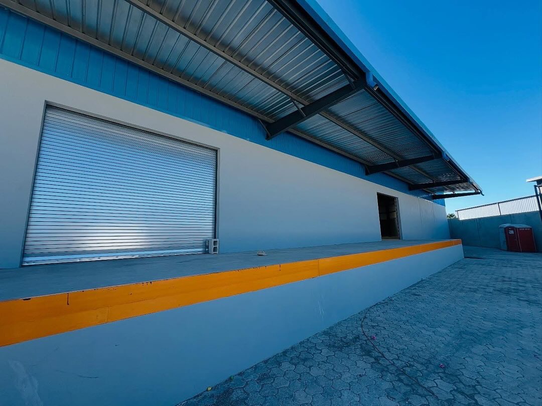 Large Industrial Warehouse for RENT in Parcs Industriels Métropolitain, Tabarre, Airport Road, Port-au-Prince, Haiti – 27,000 ft² (2,508 m²) – Suitable for Self-Storage Facility, Third-Party Logistics, Bulk Goods Storage, Vehicle Storage, Fulfillment Center, Wholesale Distribution Hub, Ghost Kitchens, Light Manufacturing, Artisanal Workshop, Co-Working, Maker Space, and More – Parking Spaces for Multiple Cargo, Container Delivery, Dump & Equipment Trailers, and More…