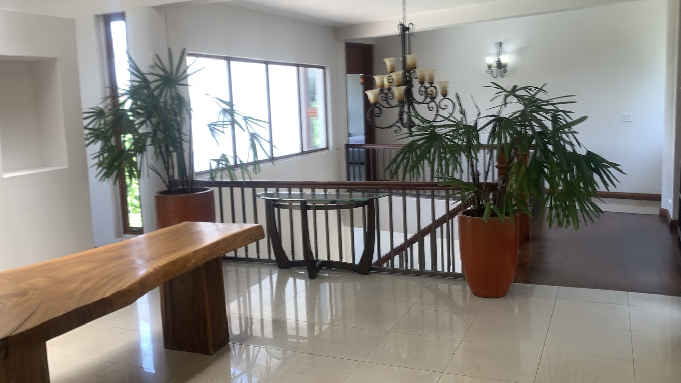 Lavish Furnished Paraseismic Mansion for Sale in Juvenat (Karibe Hotel Green Zone), Port-au-Prince, Haiti – 4 Spacious Bedrooms with Modern High-end Furniture & Appliances, Large Circular Living/Dining Rooms, 3 1/2 Stylish Bathrooms, Gourmet Kitchen, Panoramic Living/Dining Rooms, Gleaming Swimming Pool with Attached Jacuzzi, Multiple Seating Areas, Exclusive/Private Neighborhood, Robust 24/7 Solar-Powered Electricity System, Servant/Security Quarter