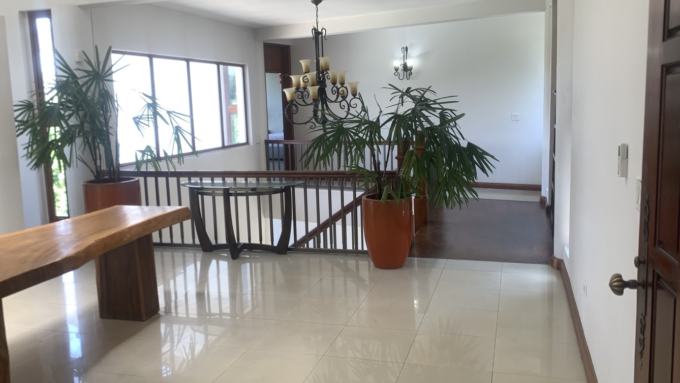Lavish Furnished Paraseismic Mansion for Sale in Juvenat (Karibe Hotel Green Zone), Port-au-Prince, Haiti – 4 Spacious Bedrooms with Modern High-end Furniture & Appliances, Large Circular Living/Dining Rooms, 3 1/2 Stylish Bathrooms, Gourmet Kitchen, Panoramic Living/Dining Rooms, Gleaming Swimming Pool with Attached Jacuzzi, Multiple Seating Areas, Exclusive/Private Neighborhood, Robust 24/7 Solar-Powered Electricity System, Servant/Security Quarter