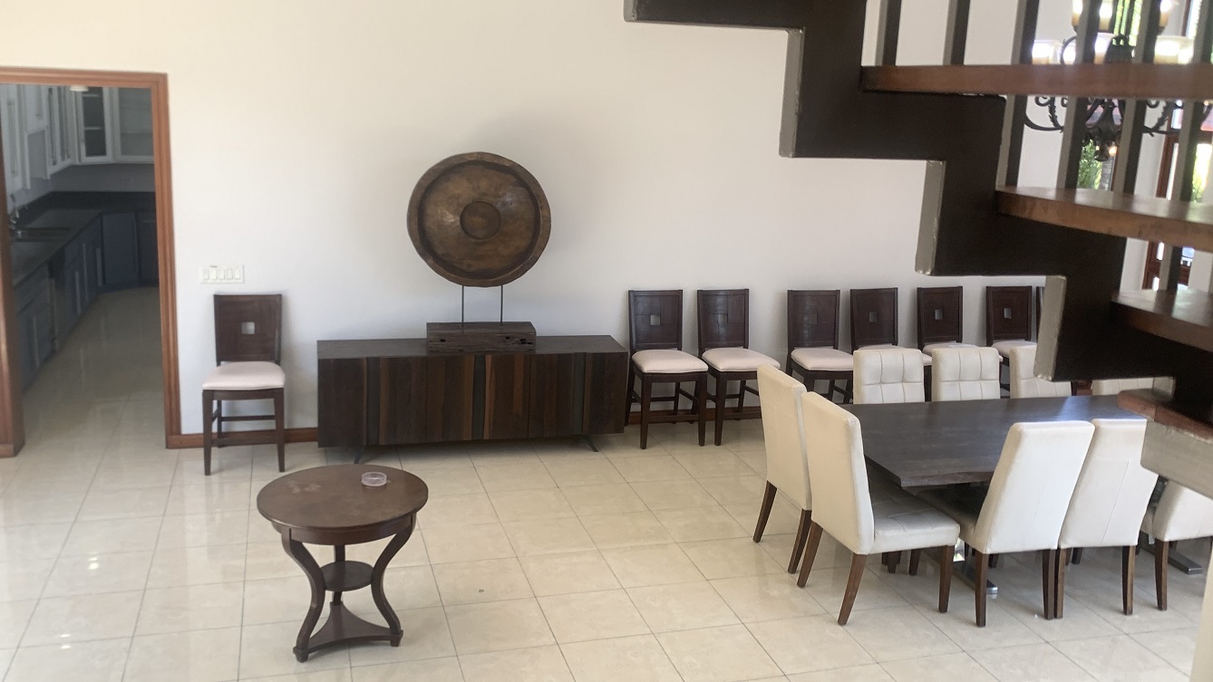 Lavish Furnished Paraseismic Mansion for Sale in Juvenat (Karibe Hotel Green Zone), Port-au-Prince, Haiti – 4 Spacious Bedrooms with Modern High-end Furniture & Appliances, Large Circular Living/Dining Rooms, 3 1/2 Stylish Bathrooms, Gourmet Kitchen, Panoramic Living/Dining Rooms, Gleaming Swimming Pool with Attached Jacuzzi, Multiple Seating Areas, Exclusive/Private Neighborhood, Robust 24/7 Solar-Powered Electricity System, Servant/Security Quarter