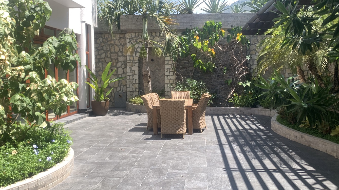 Lavish Furnished Paraseismic Mansion for Sale in Juvenat (Karibe Hotel Green Zone), Port-au-Prince, Haiti – 4 Spacious Bedrooms with Modern High-end Furniture & Appliances, Large Circular Living/Dining Rooms, 3 1/2 Stylish Bathrooms, Gourmet Kitchen, Panoramic Living/Dining Rooms, Gleaming Swimming Pool with Attached Jacuzzi, Multiple Seating Areas, Exclusive/Private Neighborhood, Robust 24/7 Solar-Powered Electricity System, Servant/Security Quarter