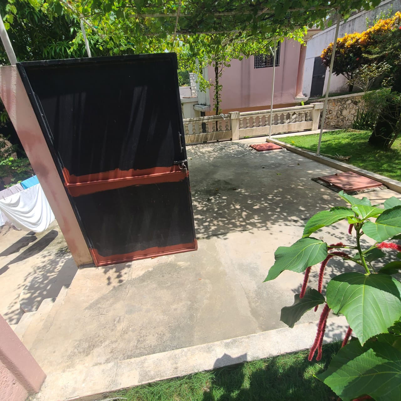 Stunning Furnished House for SALE in Lower Morne Calvaire, Petion-Ville, Haiti – 3 Spacious Bedrooms with Modern High-end Furniture & Appliances, Capacious Living/Dining Rooms, 3 1/2 Stylish Bathrooms, Gourmet Kitchen, Panoramic Living/Dining Rooms, Radiant Swimming Pool with Chairs, Chaise Loungers, & Tables, Multiple Seating Areas, Exclusive/Private Neighborhood, Robust 24/7 Solar-Powered Electricity System, Servant/Security Quarters, Manicure, Lush Green Trees