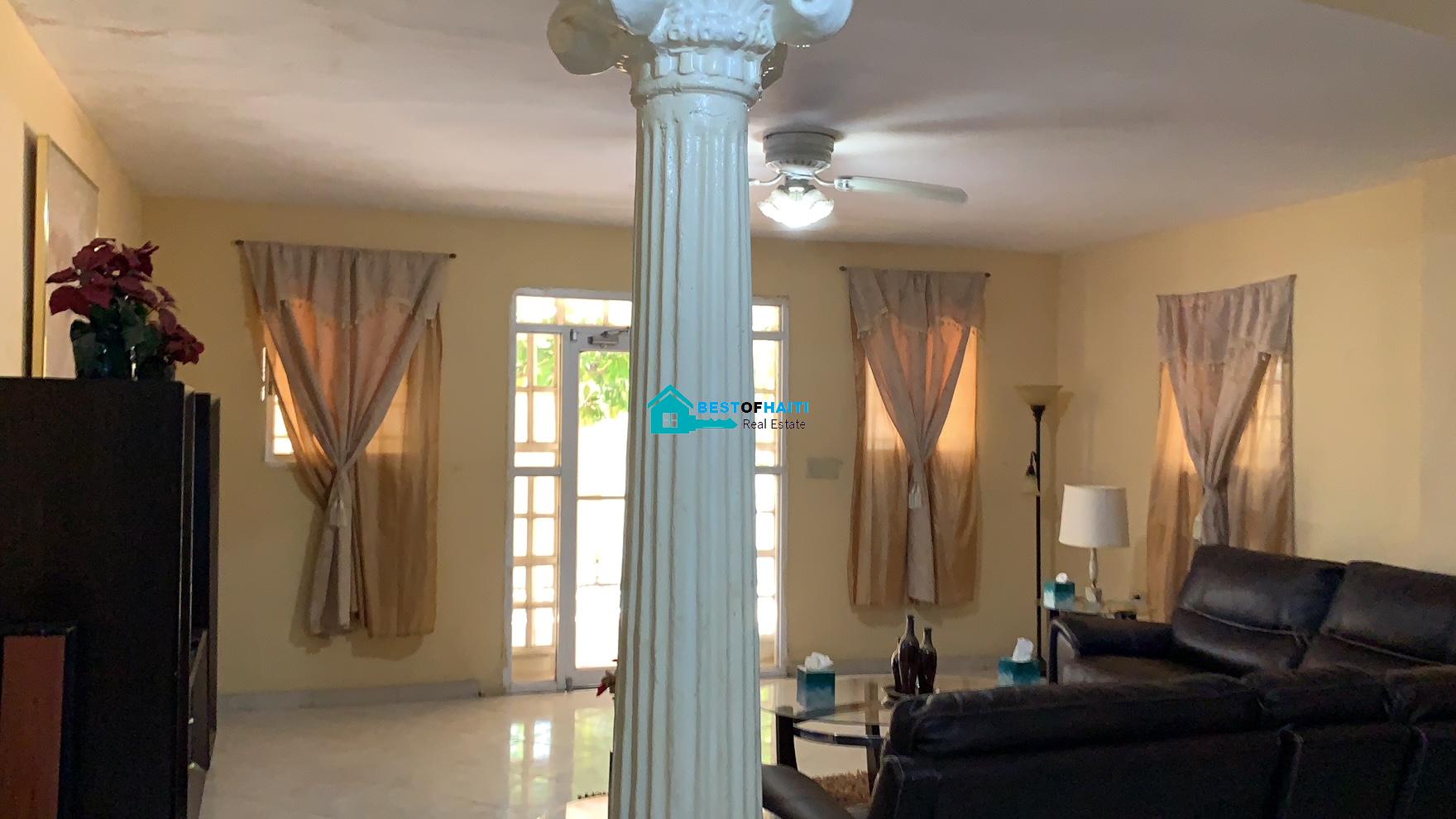 Beautiful, 3-Story, Mega Furnished House For Sale in Santo 17, Port-au-Prince, Haiti – 8 Spacious Bedrooms with Walk-in Closets, 7 Bathrooms, Multiple Living & Dining Rooms, Modern Kitchen, Floor-to-Ceiling Windows, Several Balconies, Servant Quarters, Big Yards/Gardens, 80-foot Artesian Well, High Fences, 2 Iron Gates, Lots of Parking Spaces
