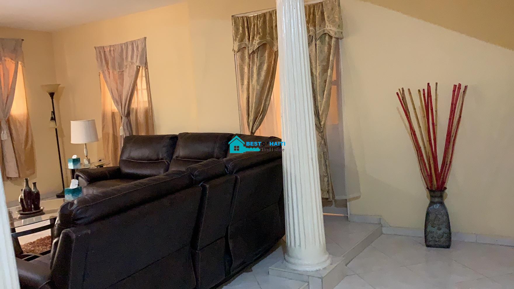 Beautiful, 3-Story, Mega Furnished House For Sale in Santo 17, Port-au-Prince, Haiti – 8 Spacious Bedrooms with Walk-in Closets, 7 Bathrooms, Multiple Living & Dining Rooms, Modern Kitchen, Floor-to-Ceiling Windows, Several Balconies, Servant Quarters, Big Yards/Gardens, 80-foot Artesian Well, High Fences, 2 Iron Gates, Lots of Parking Spaces