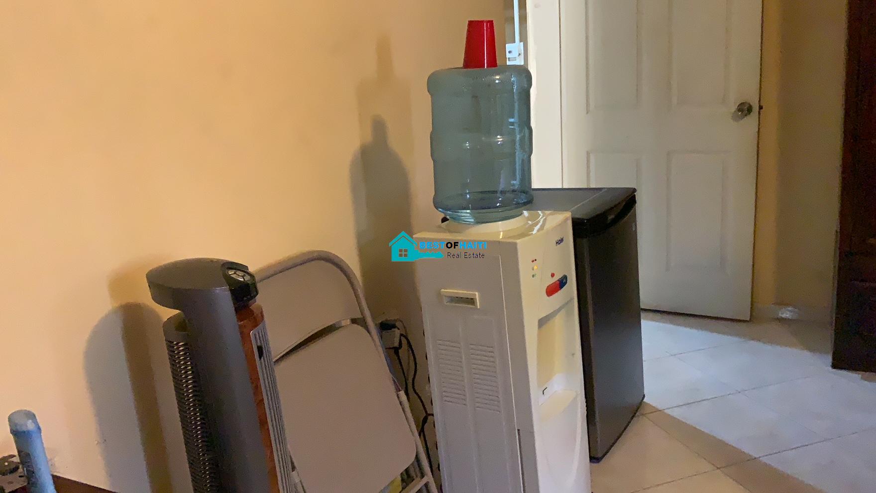 Beautiful, 3-Story, Mega Furnished House For Sale in Santo 17, Port-au-Prince, Haiti – 8 Spacious Bedrooms with Walk-in Closets, 7 Bathrooms, Multiple Living & Dining Rooms, Modern Kitchen, Floor-to-Ceiling Windows, Several Balconies, Servant Quarters, Big Yards/Gardens, 80-foot Artesian Well, High Fences, 2 Iron Gates, Lots of Parking Spaces