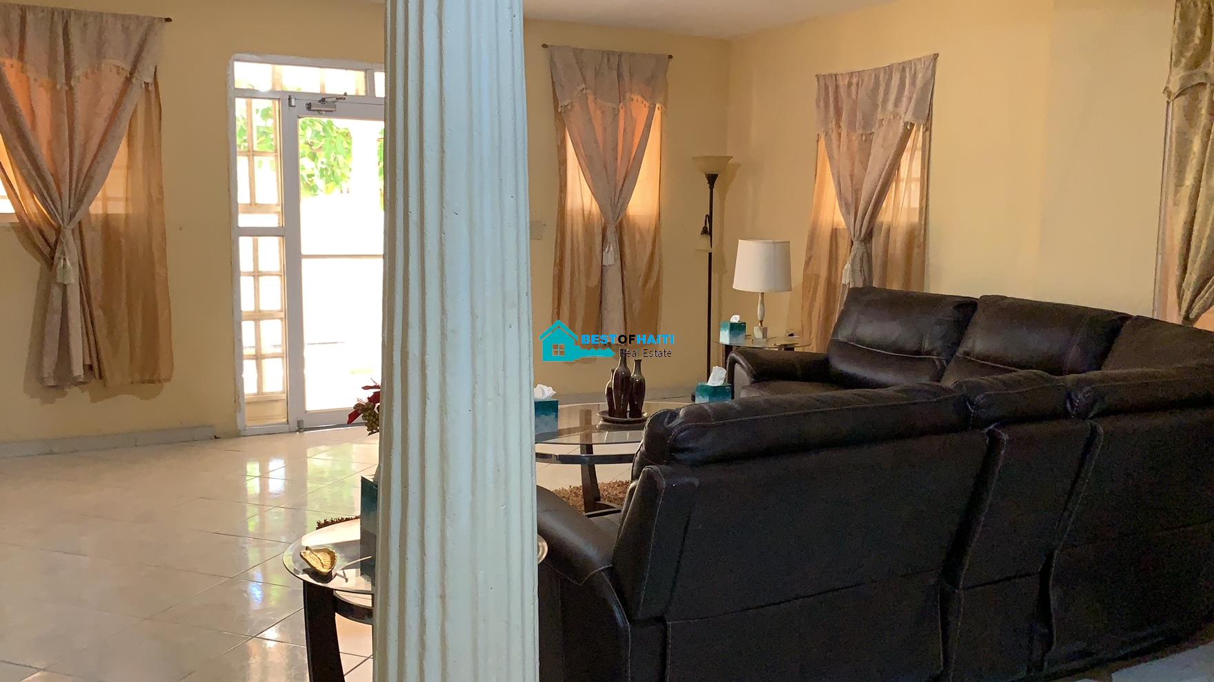 Beautiful, 3-Story, Mega Furnished House For Sale in Santo 17, Port-au-Prince, Haiti – 8 Spacious Bedrooms with Walk-in Closets, 7 Bathrooms, Multiple Living & Dining Rooms, Modern Kitchen, Floor-to-Ceiling Windows, Several Balconies, Servant Quarters, Big Yards/Gardens, 80-foot Artesian Well, High Fences, 2 Iron Gates, Lots of Parking Spaces