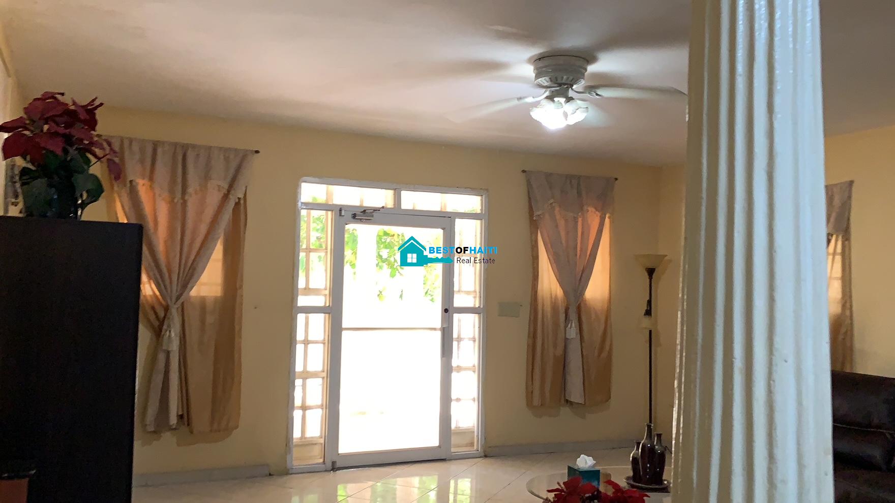 Beautiful, 3-Story, Mega Furnished House For Sale in Santo 17, Port-au-Prince, Haiti – 8 Spacious Bedrooms with Walk-in Closets, 7 Bathrooms, Multiple Living & Dining Rooms, Modern Kitchen, Floor-to-Ceiling Windows, Several Balconies, Servant Quarters, Big Yards/Gardens, 80-foot Artesian Well, High Fences, 2 Iron Gates, Lots of Parking Spaces