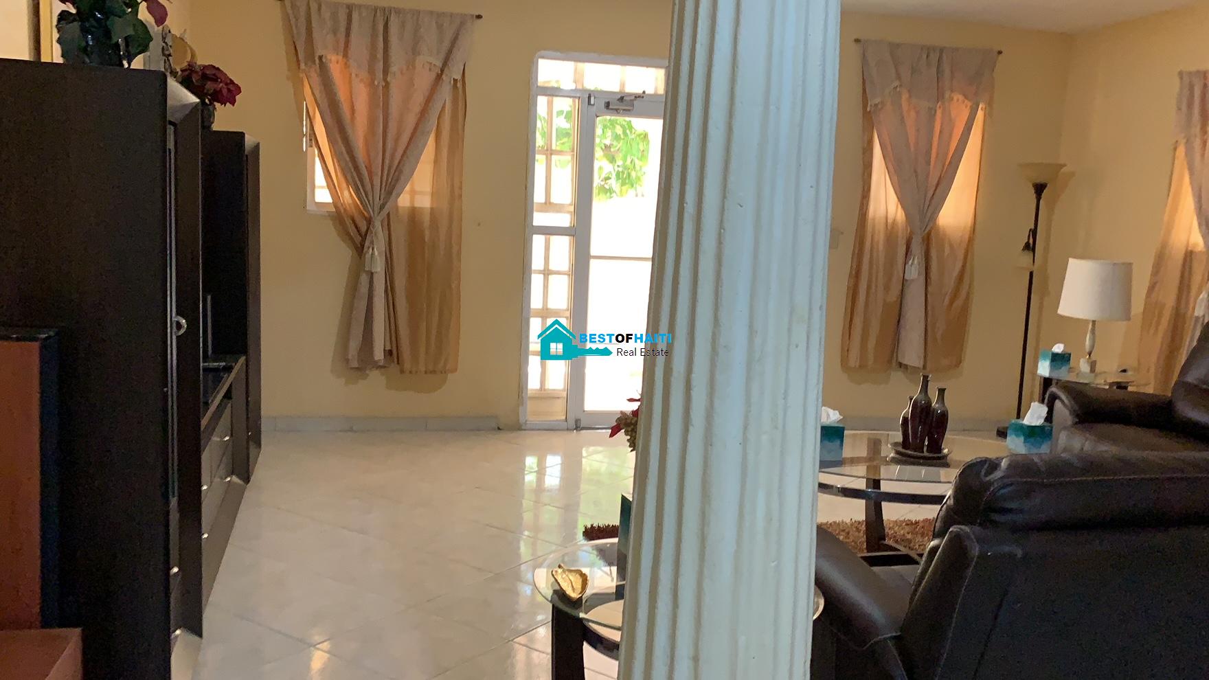 Beautiful, 3-Story, Mega Furnished House For Sale in Santo 17, Port-au-Prince, Haiti – 8 Spacious Bedrooms with Walk-in Closets, 7 Bathrooms, Multiple Living & Dining Rooms, Modern Kitchen, Floor-to-Ceiling Windows, Several Balconies, Servant Quarters, Big Yards/Gardens, 80-foot Artesian Well, High Fences, 2 Iron Gates, Lots of Parking Spaces