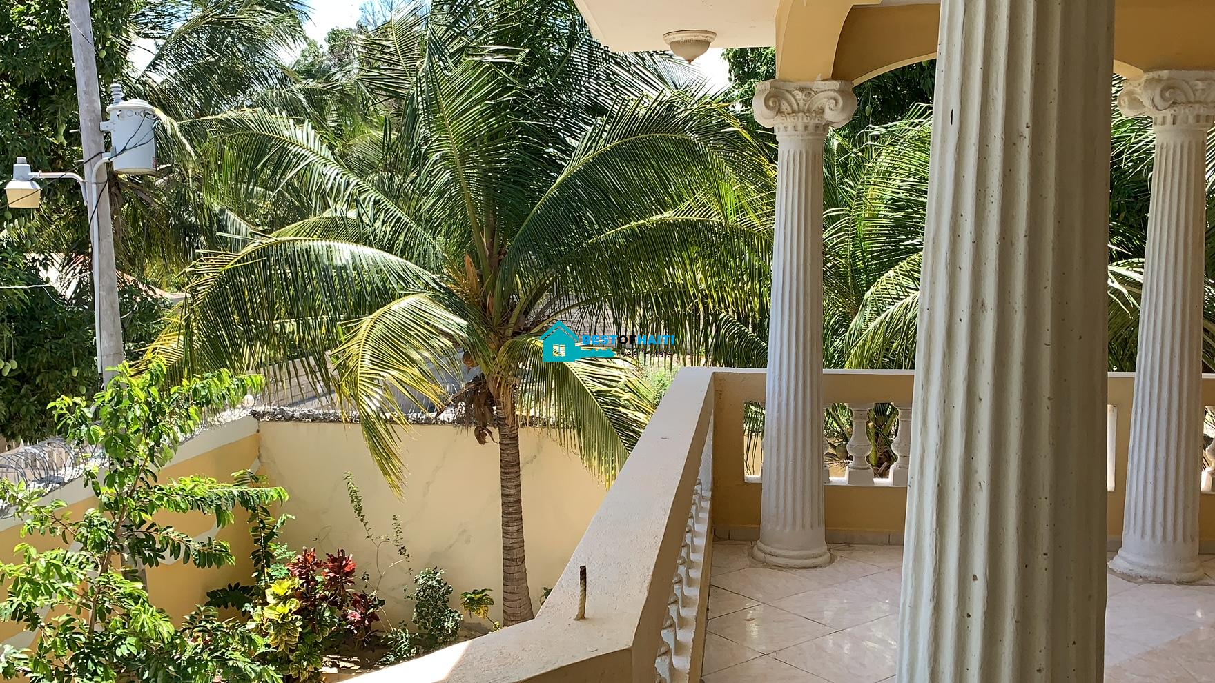 Beautiful, 3-Story, Mega Furnished House For Sale in Santo 17, Port-au-Prince, Haiti – 8 Spacious Bedrooms with Walk-in Closets, 7 Bathrooms, Multiple Living & Dining Rooms, Modern Kitchen, Floor-to-Ceiling Windows, Several Balconies, Servant Quarters, Big Yards/Gardens, 80-foot Artesian Well, High Fences, 2 Iron Gates, Lots of Parking Spaces